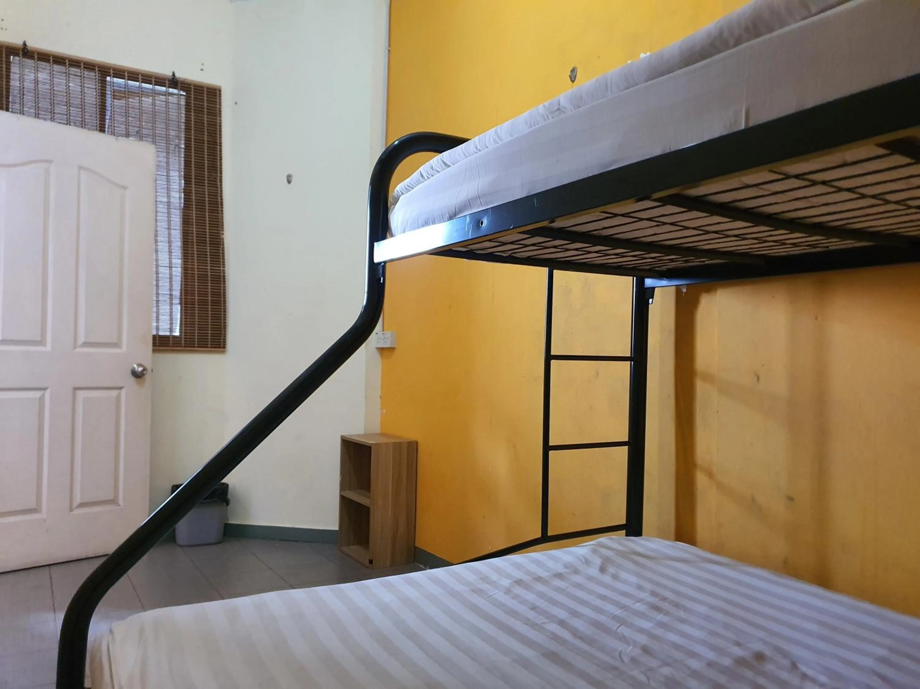 Bedroom in SPOT ON 90984 Gn Homestay