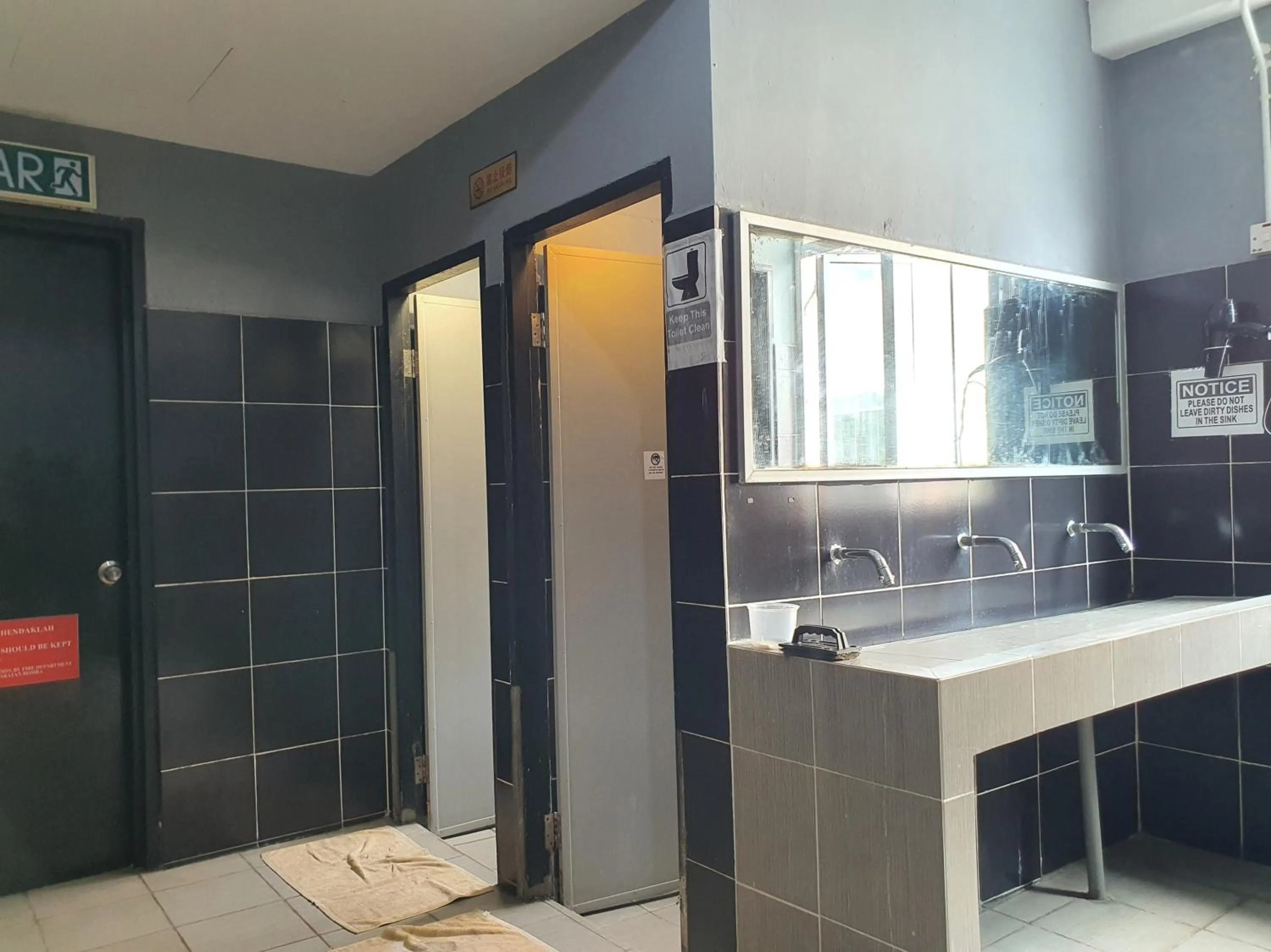 Bathroom in SPOT ON 90984 Gn Homestay