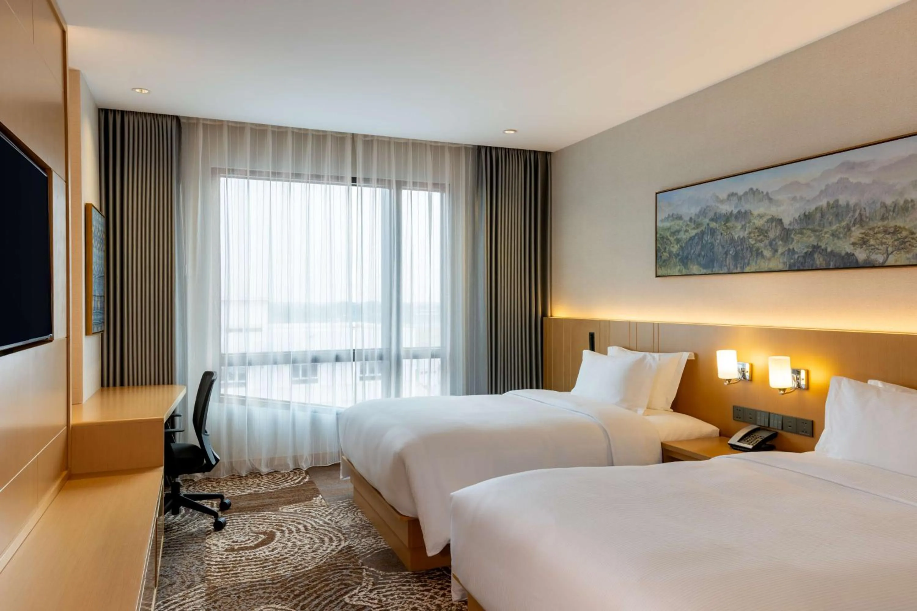 Bed in DoubleTree by Hilton Vientiane