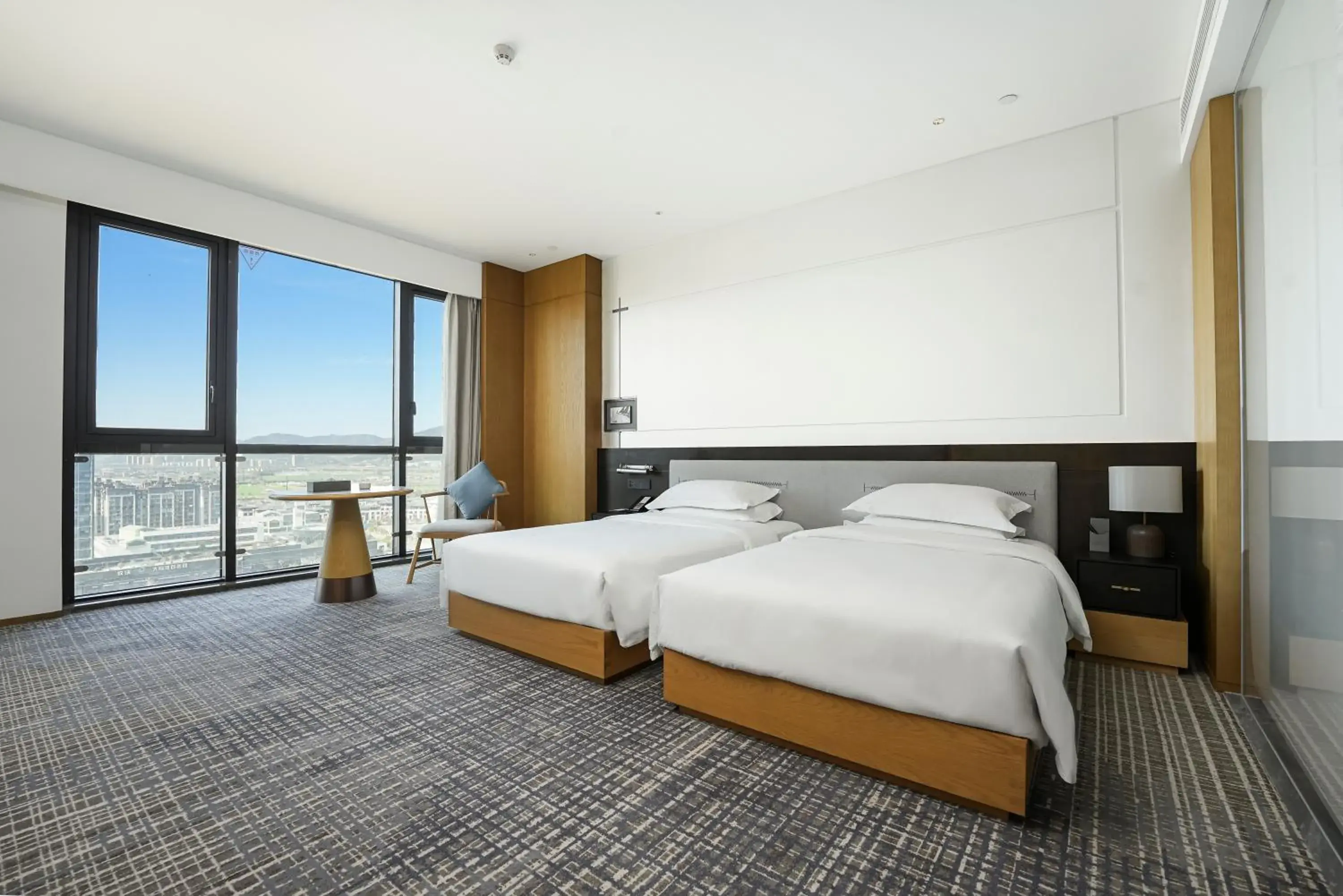 Bed in Holiday Inn Ningbo Xiangshan Damu Bay by IHG Bed in Holiday Inn Ningbo Xiangshan Damu Bay by IHG