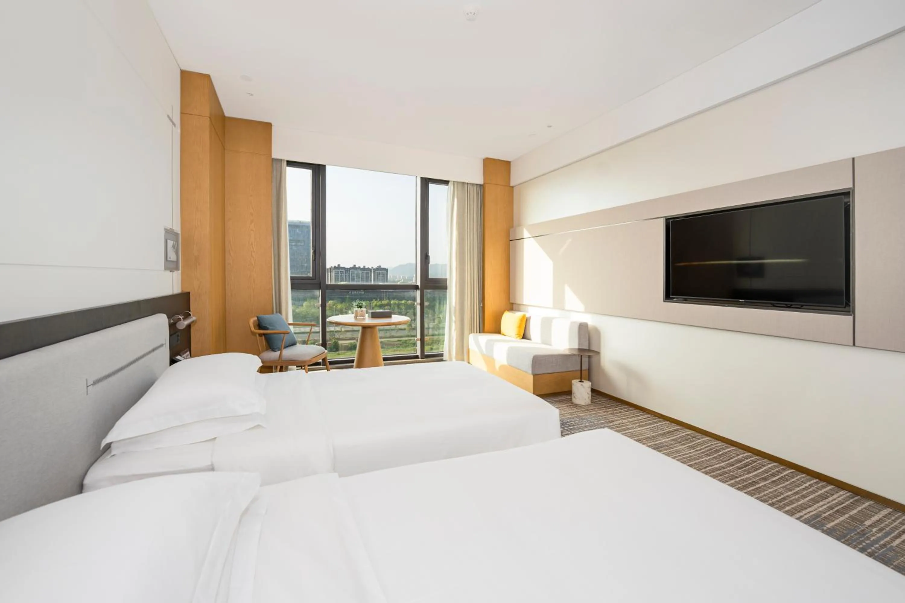 Bed in Holiday Inn Ningbo Xiangshan Damu Bay by IHG