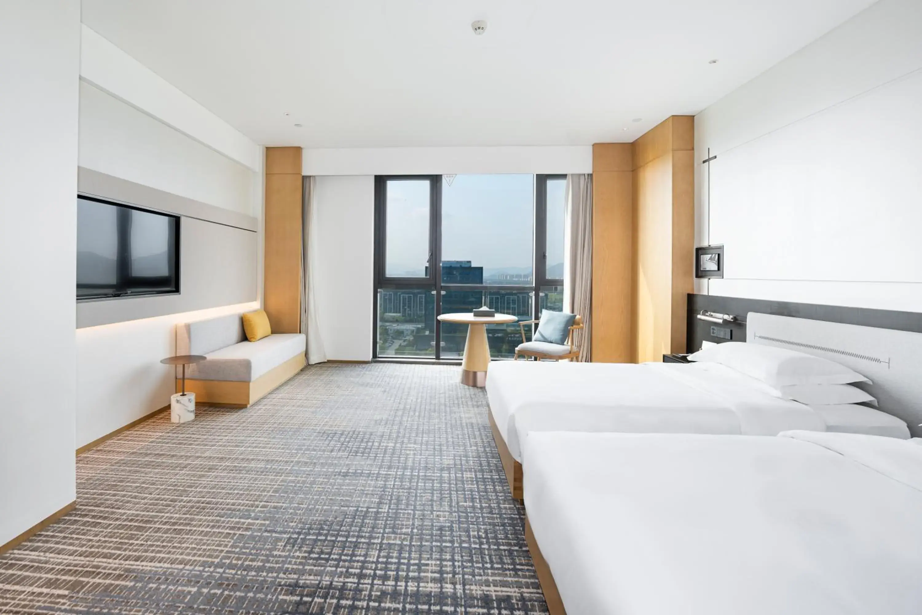 Bed in Holiday Inn Ningbo Xiangshan Damu Bay by IHG Bed in Holiday Inn Ningbo Xiangshan Damu Bay by IHG