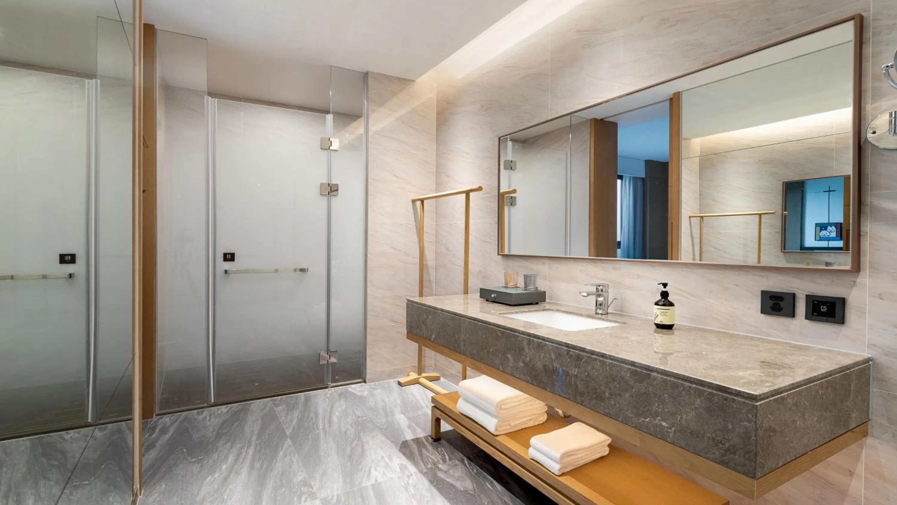 Bathroom in Holiday Inn Ningbo Xiangshan Damu Bay by IHG