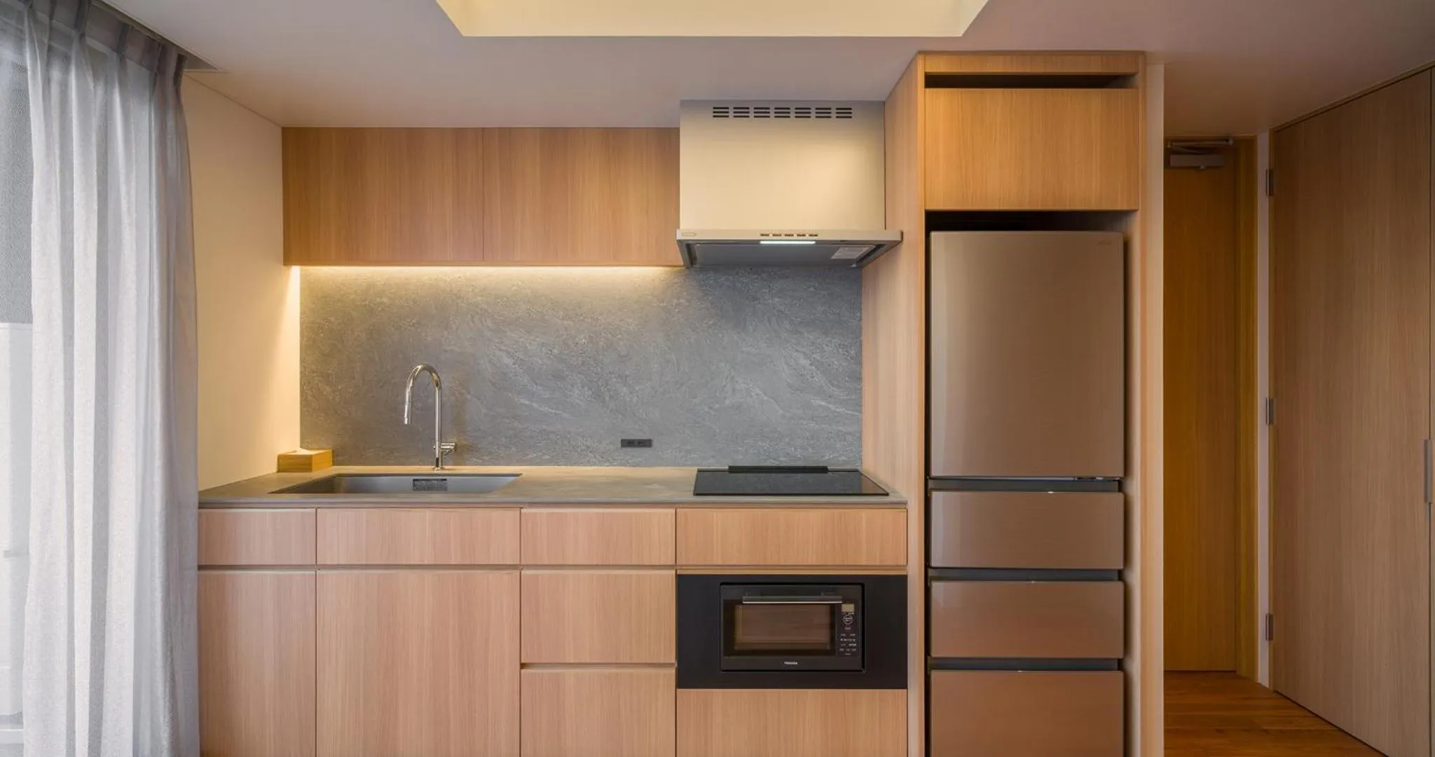 kitchen in HOTEL LA VIGNE HAKUBA by Onko Chishin