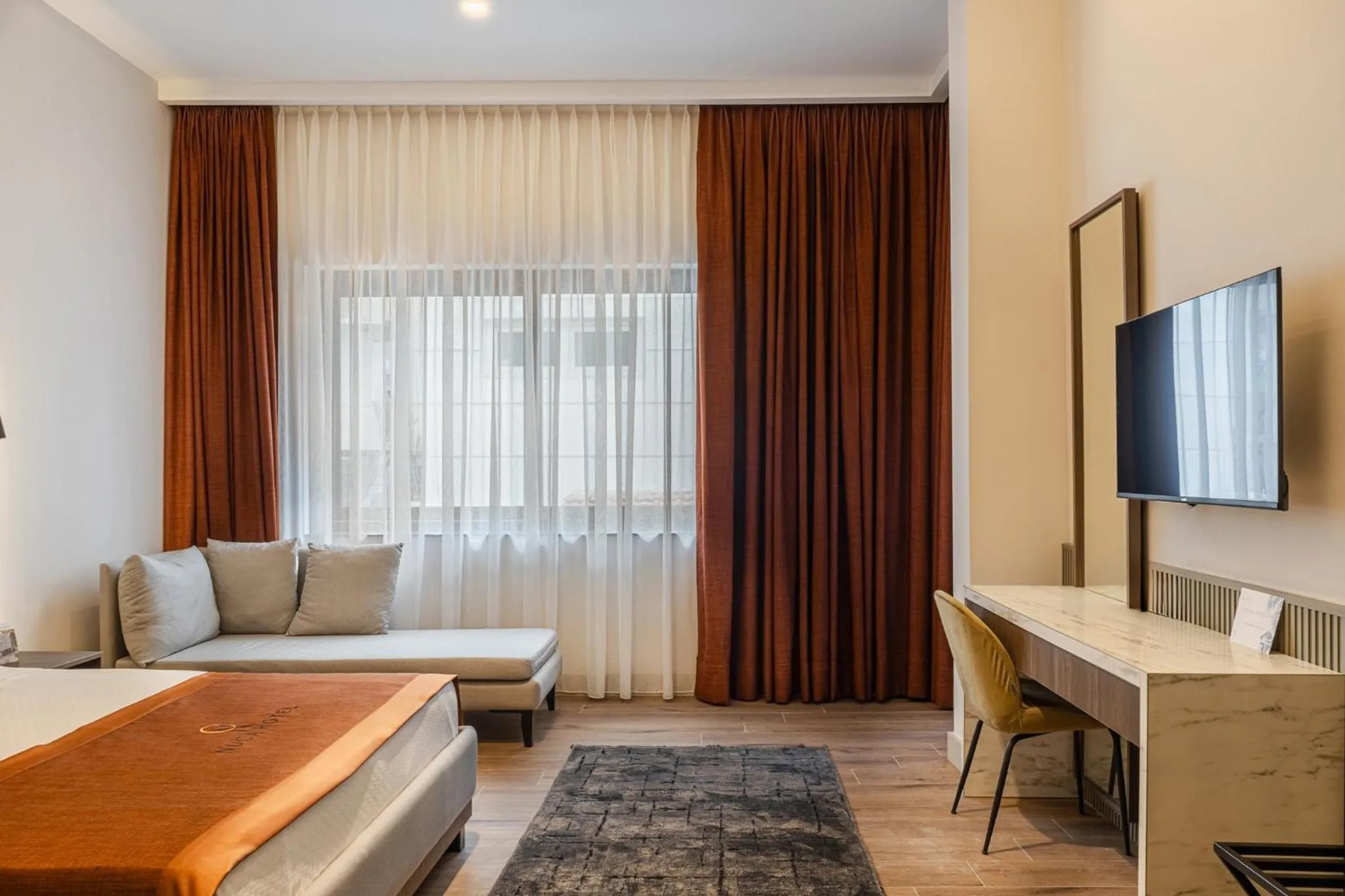 Seating area, Bed in Nuca Homes