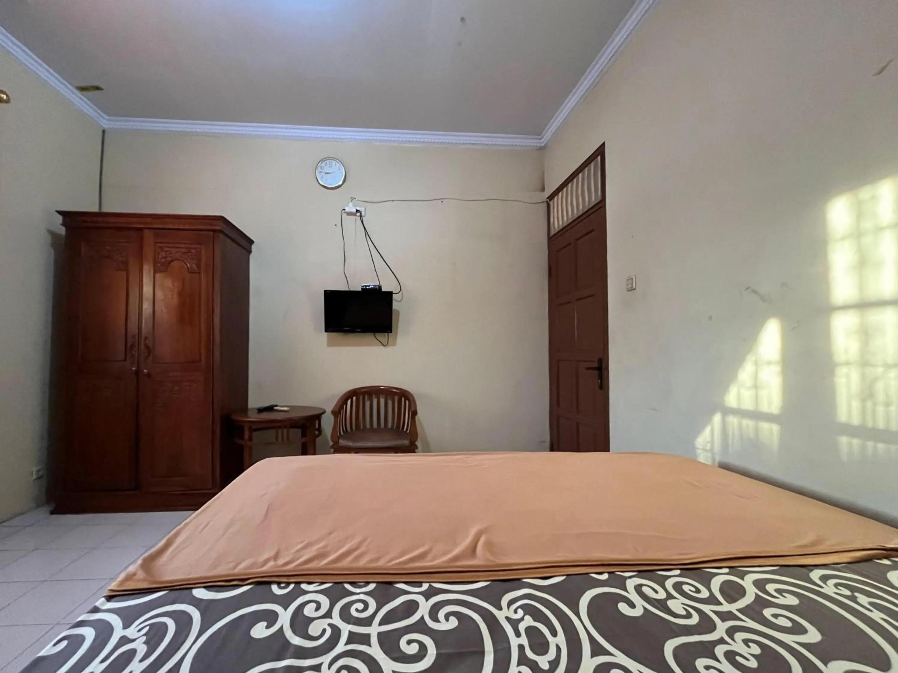 Bedroom in RedDoorz at Hotel Madani Syariah Lempuyangan