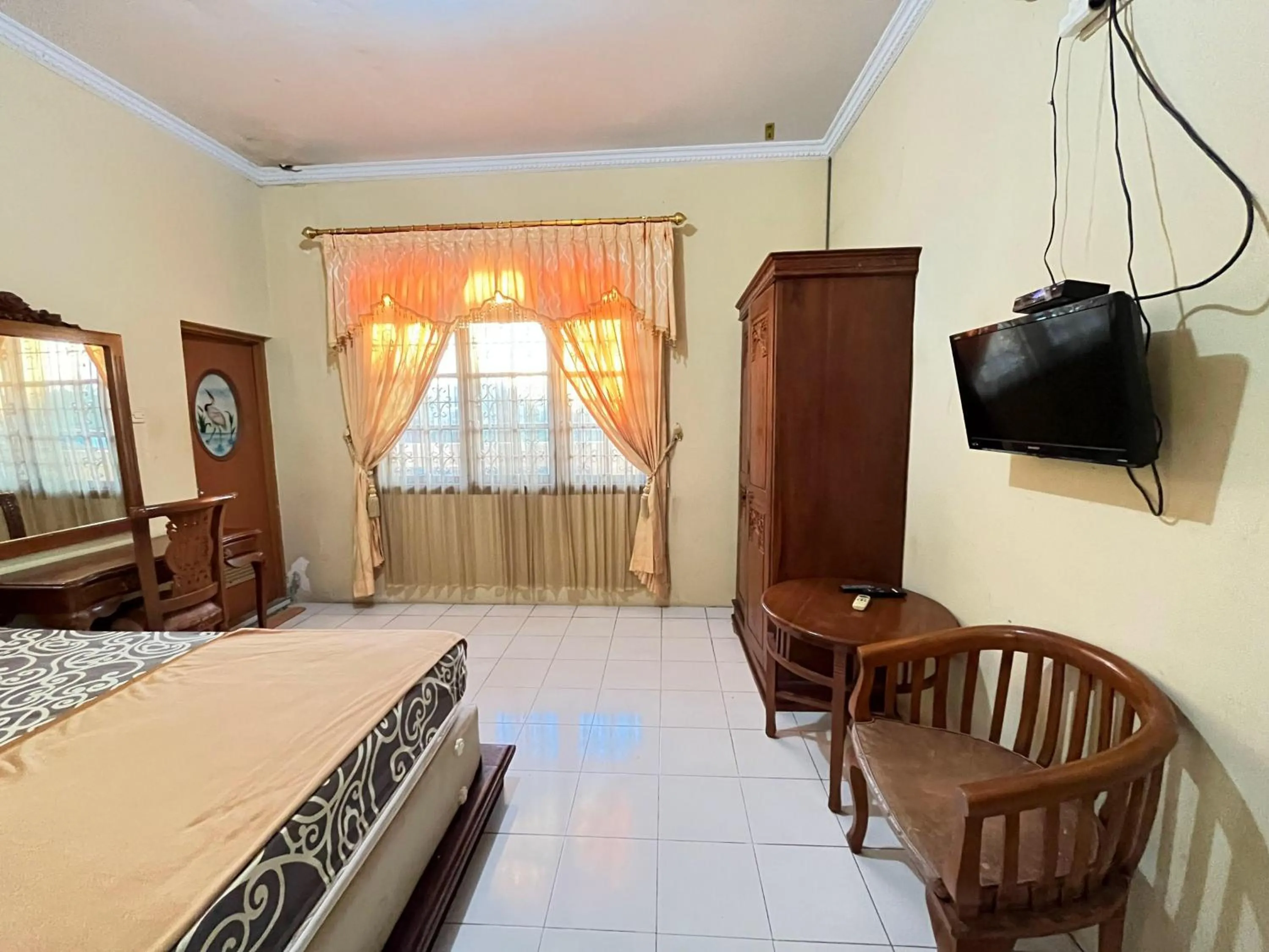 Bedroom in RedDoorz at Hotel Madani Syariah Lempuyangan