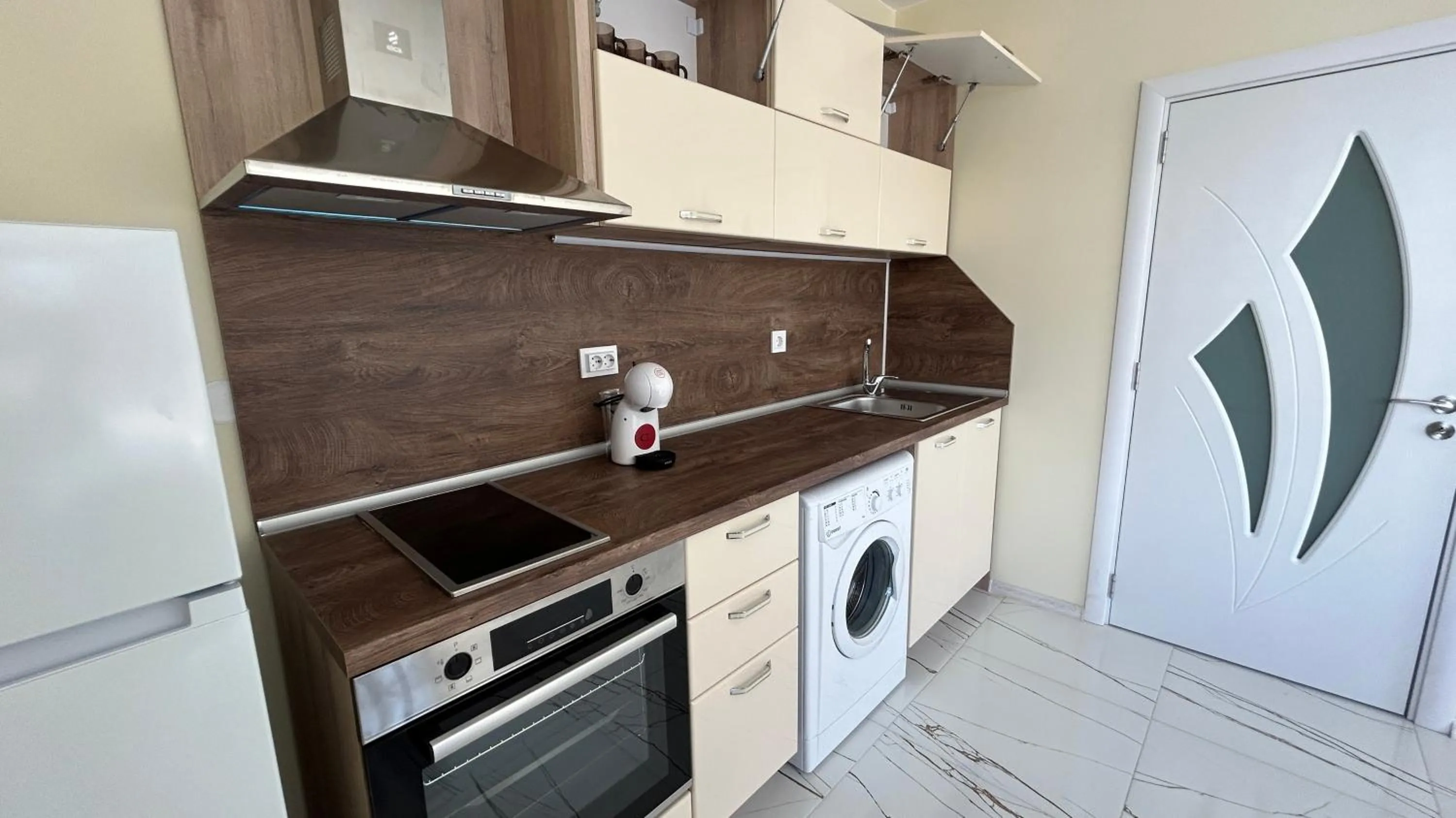 Kitchen or kitchenette in Zigrabay lovely appartments