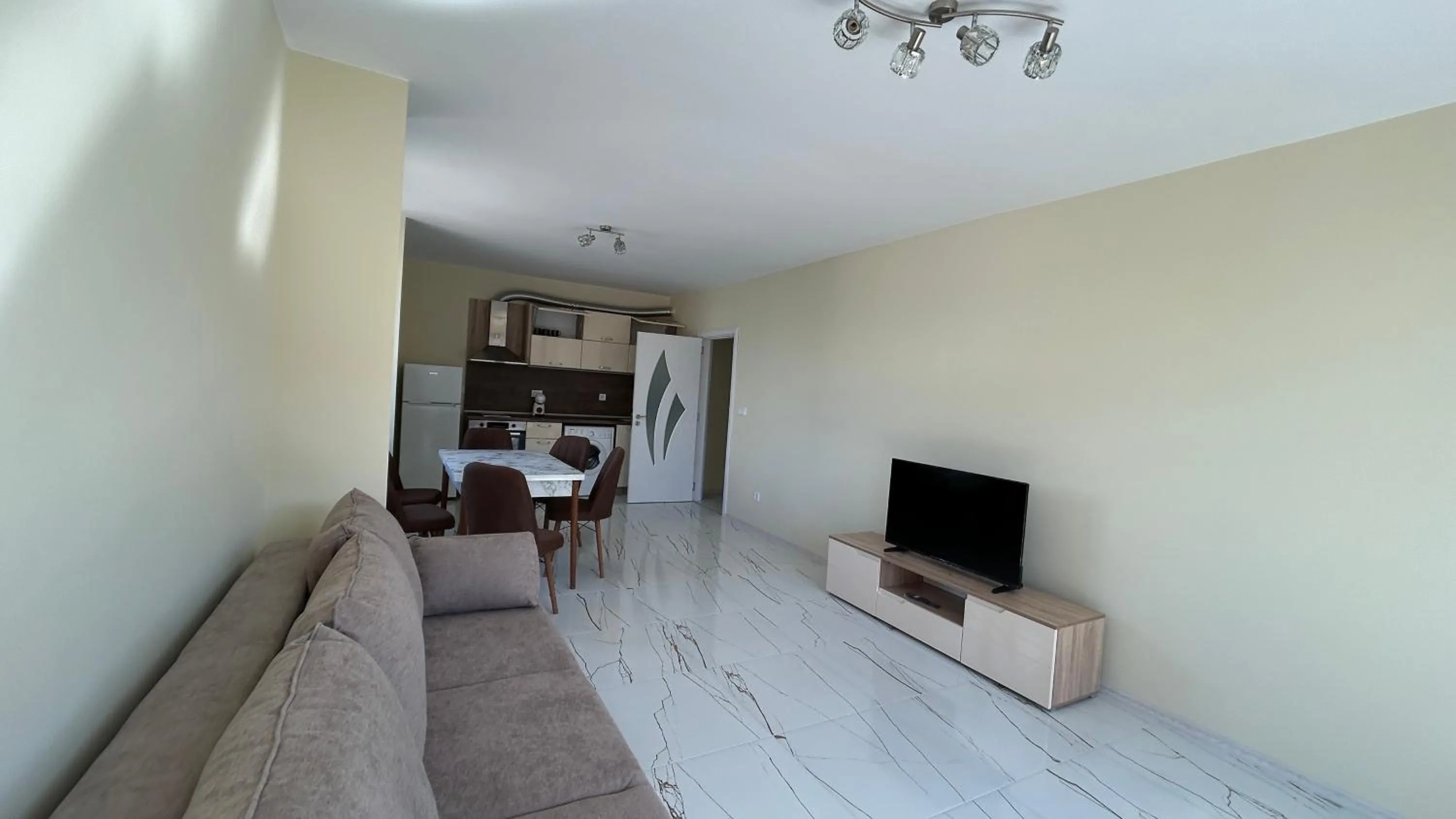 Communal lounge/ TV room in Zigrabay lovely appartments