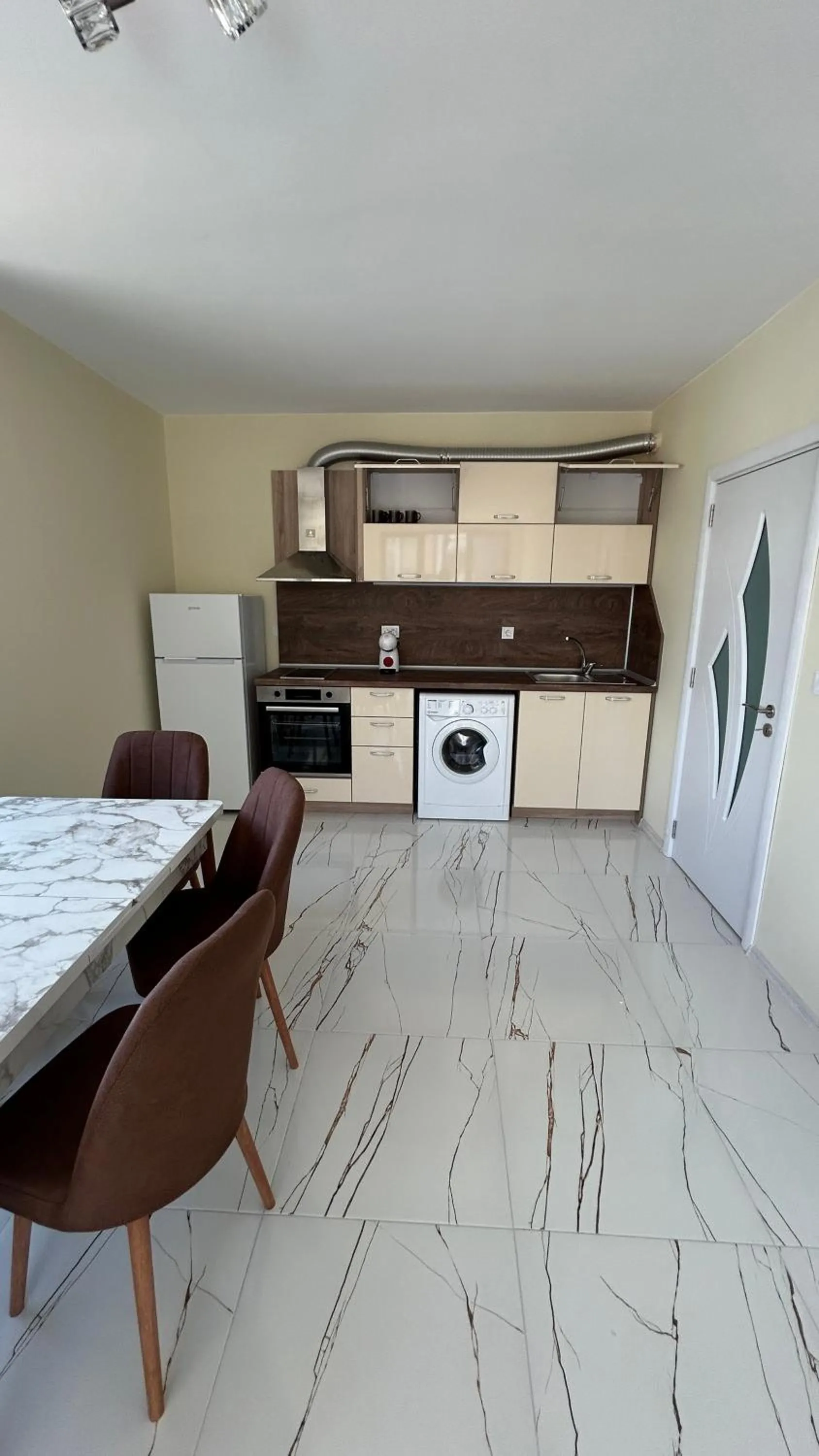 Kitchen or kitchenette in Zigrabay lovely appartments