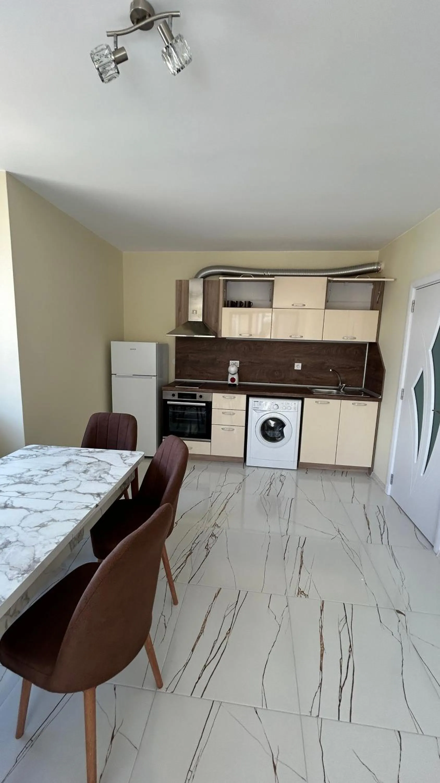 Kitchen or kitchenette in Zigrabay lovely appartments