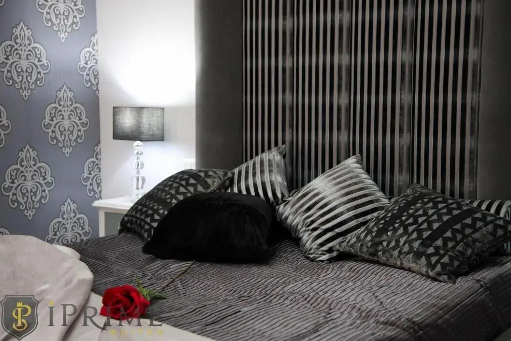 Bedroom in Sliema Central Iprime Suites Malta