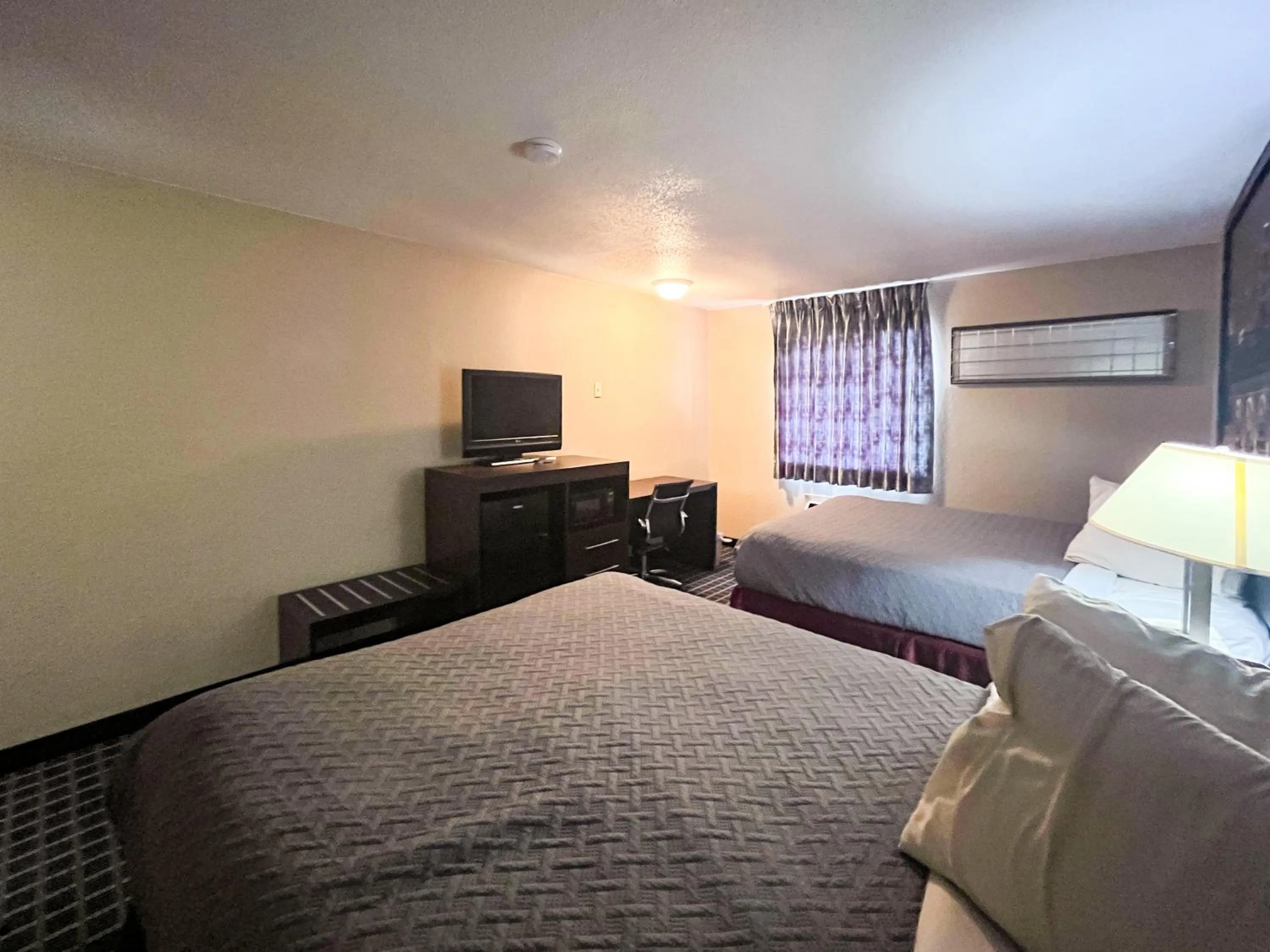 Queen Room with Two Queen Beds - Disability Access - Non-Smoking in Motel 6 Concordia