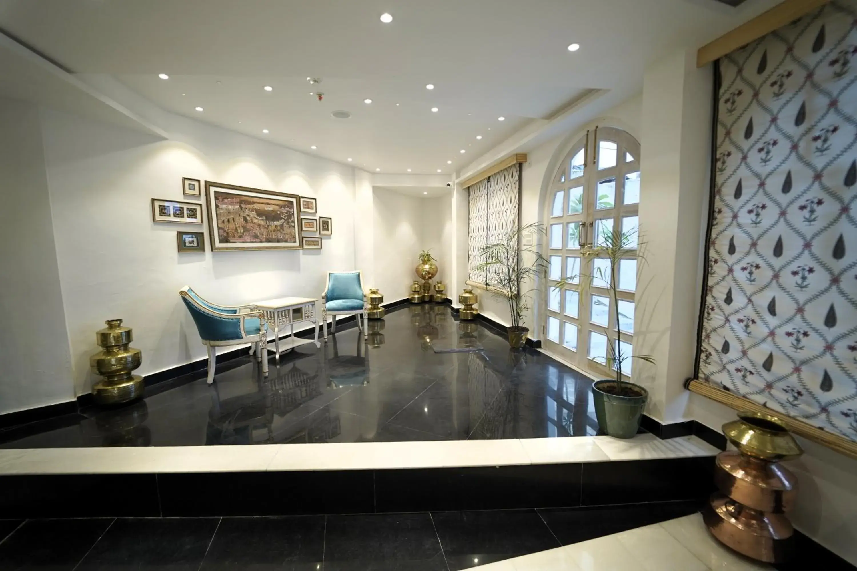 Living room in Grandrosse Boutique - Pichola Lake Facing Hotel Living room in Grandrosse Boutique - Pichola Lake Facing Hotel