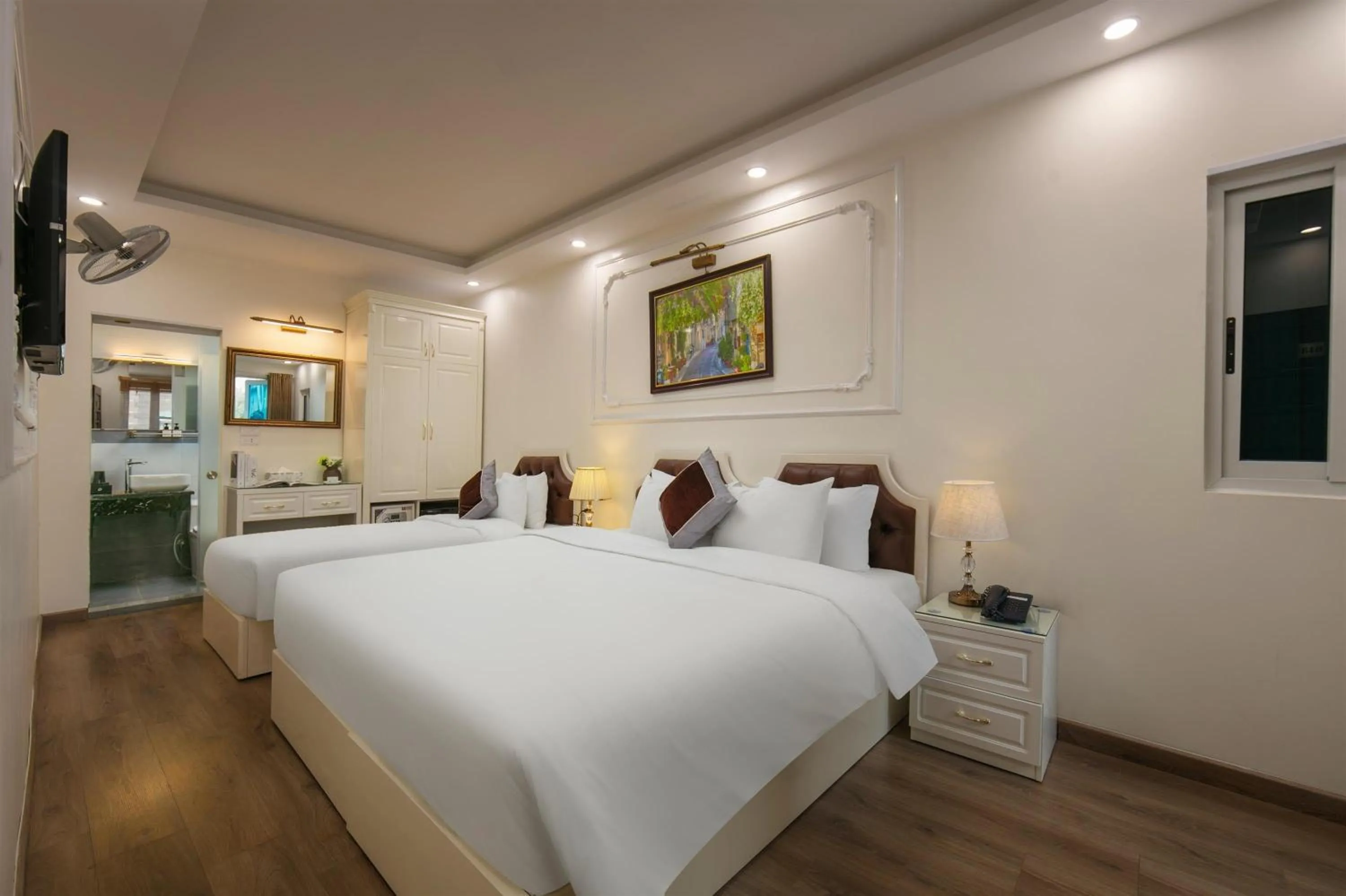 Bed in TrangTrang Luxury Hotel