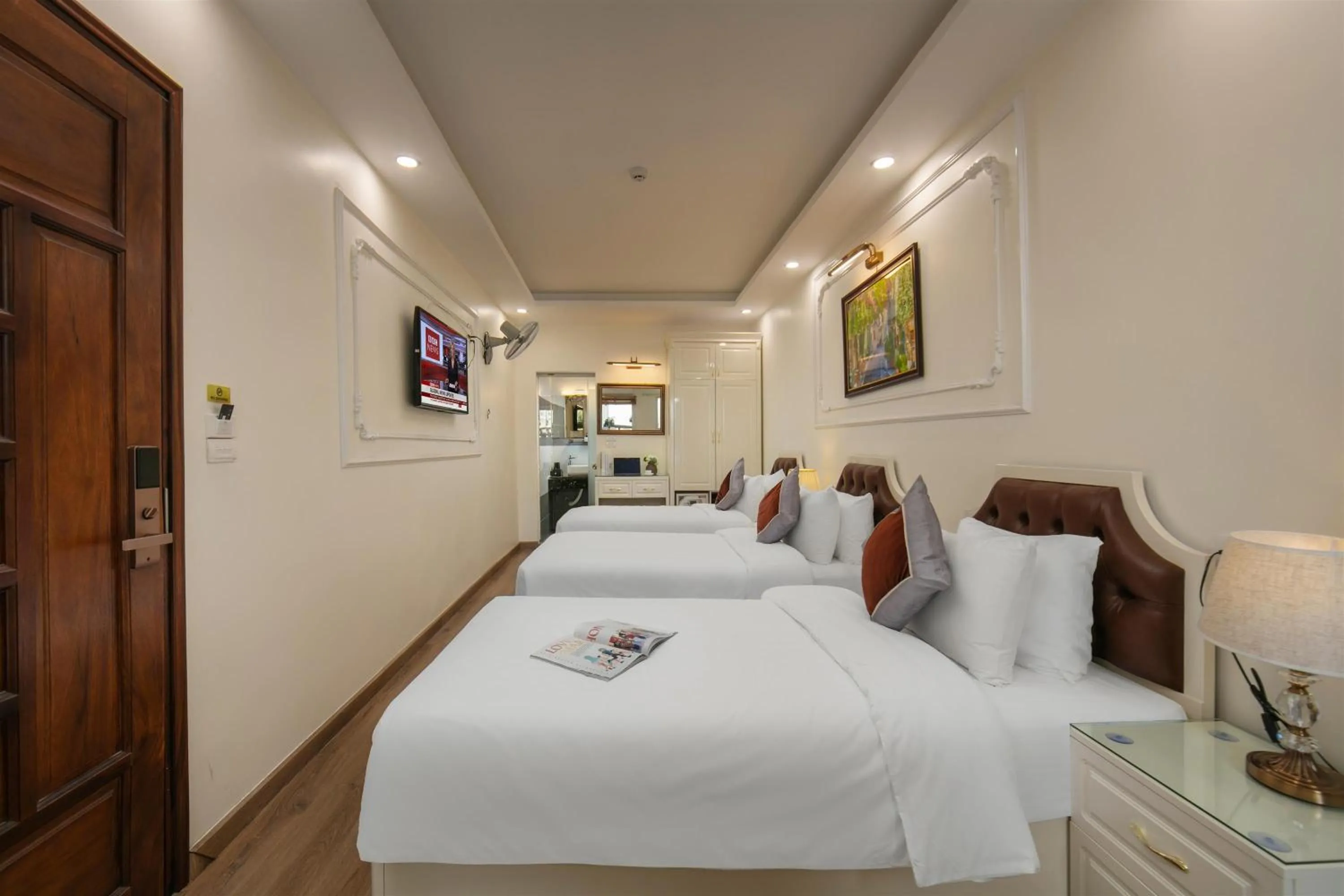 Bed in TrangTrang Luxury Hotel