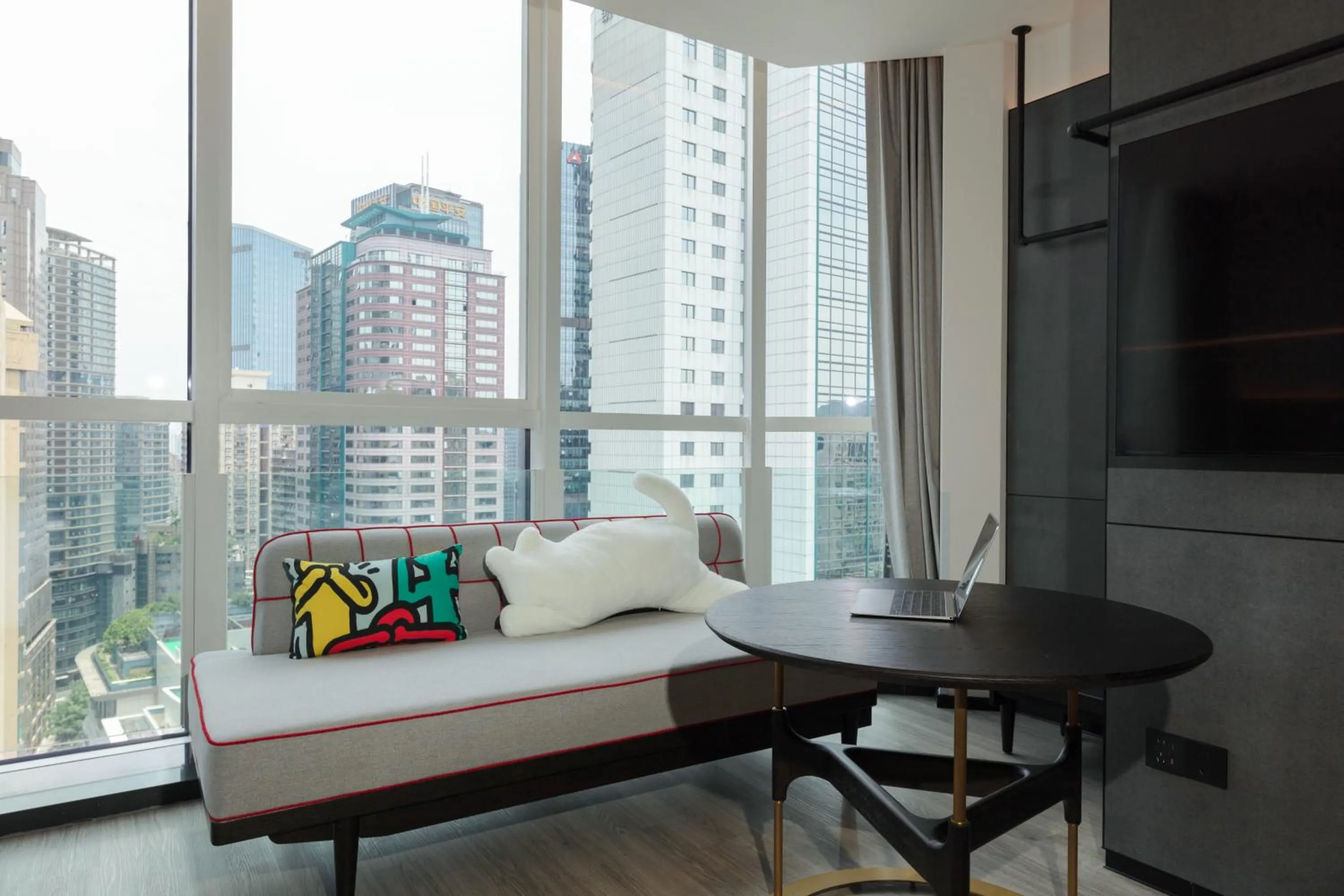 Seating area, Bed in Moxy Chongqing