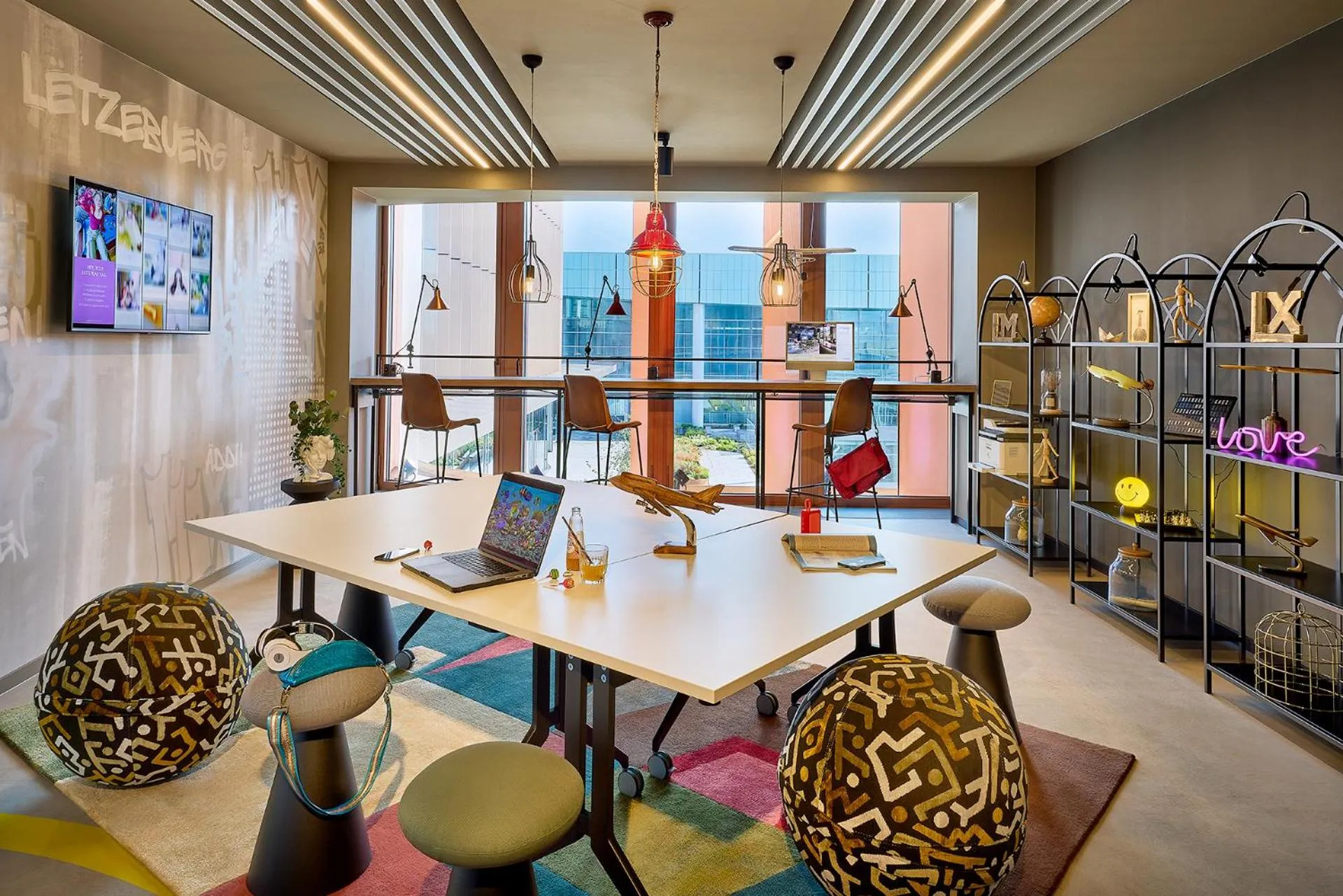 Seating area in Moxy Luxembourg Airport