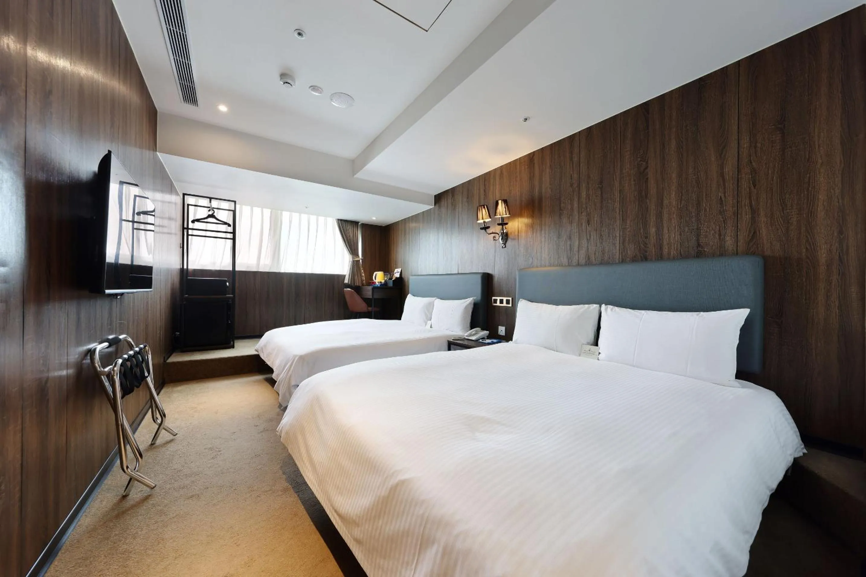 Bed in Airline Inn Ximen