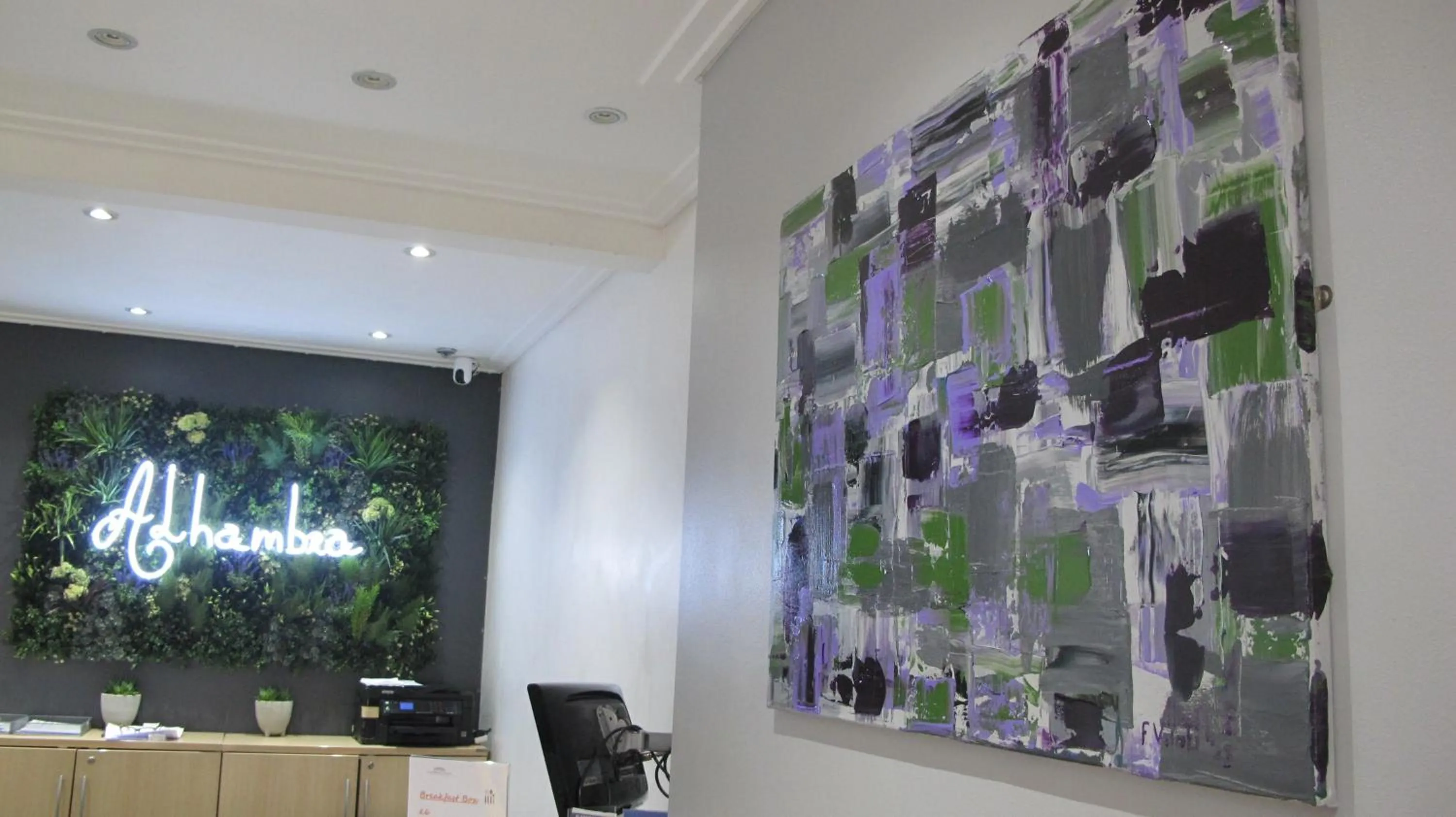 Lobby or reception in Alhambra Hotel