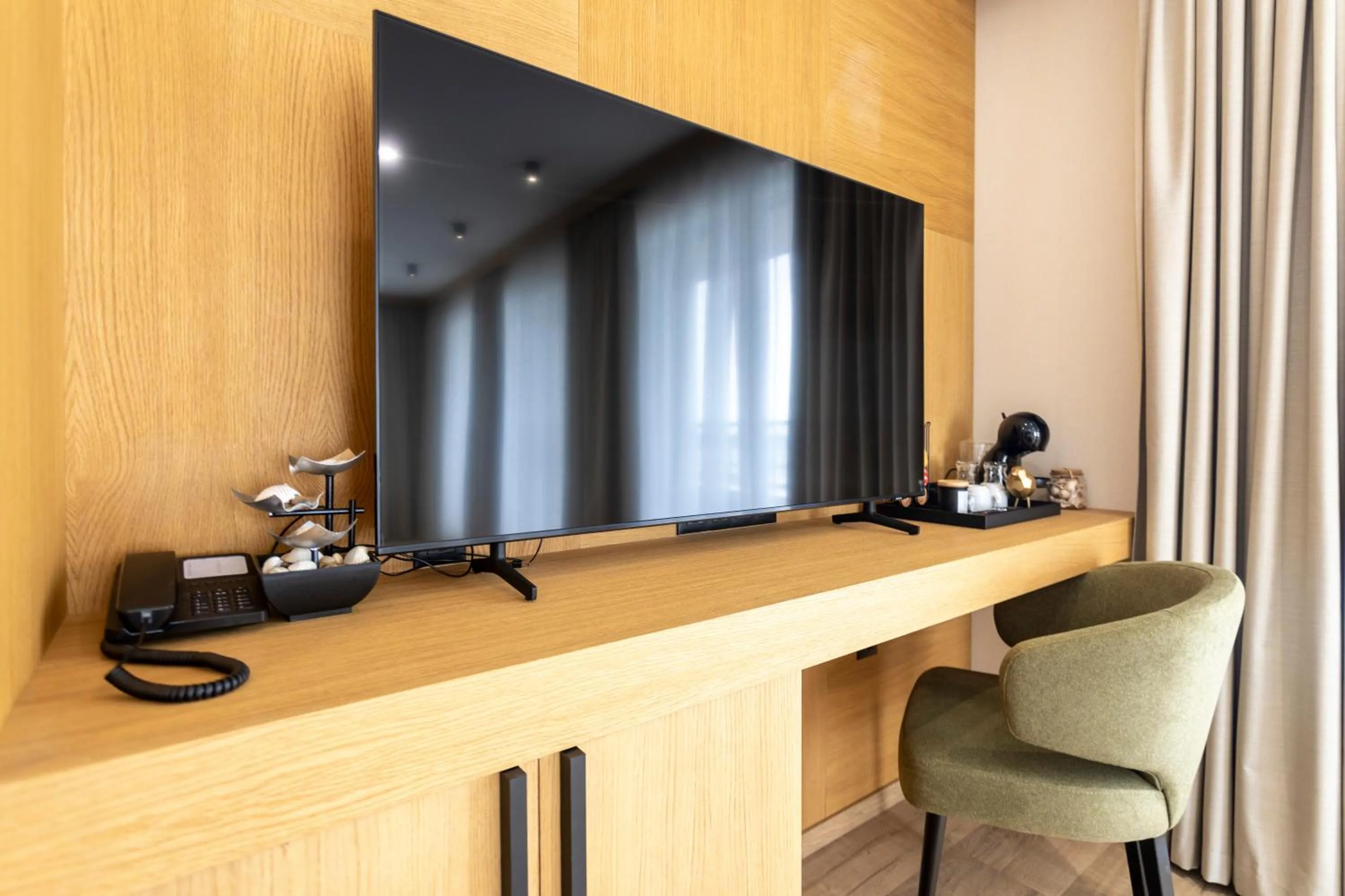 TV and multimedia in Natura All Seasons Boutique Hotel