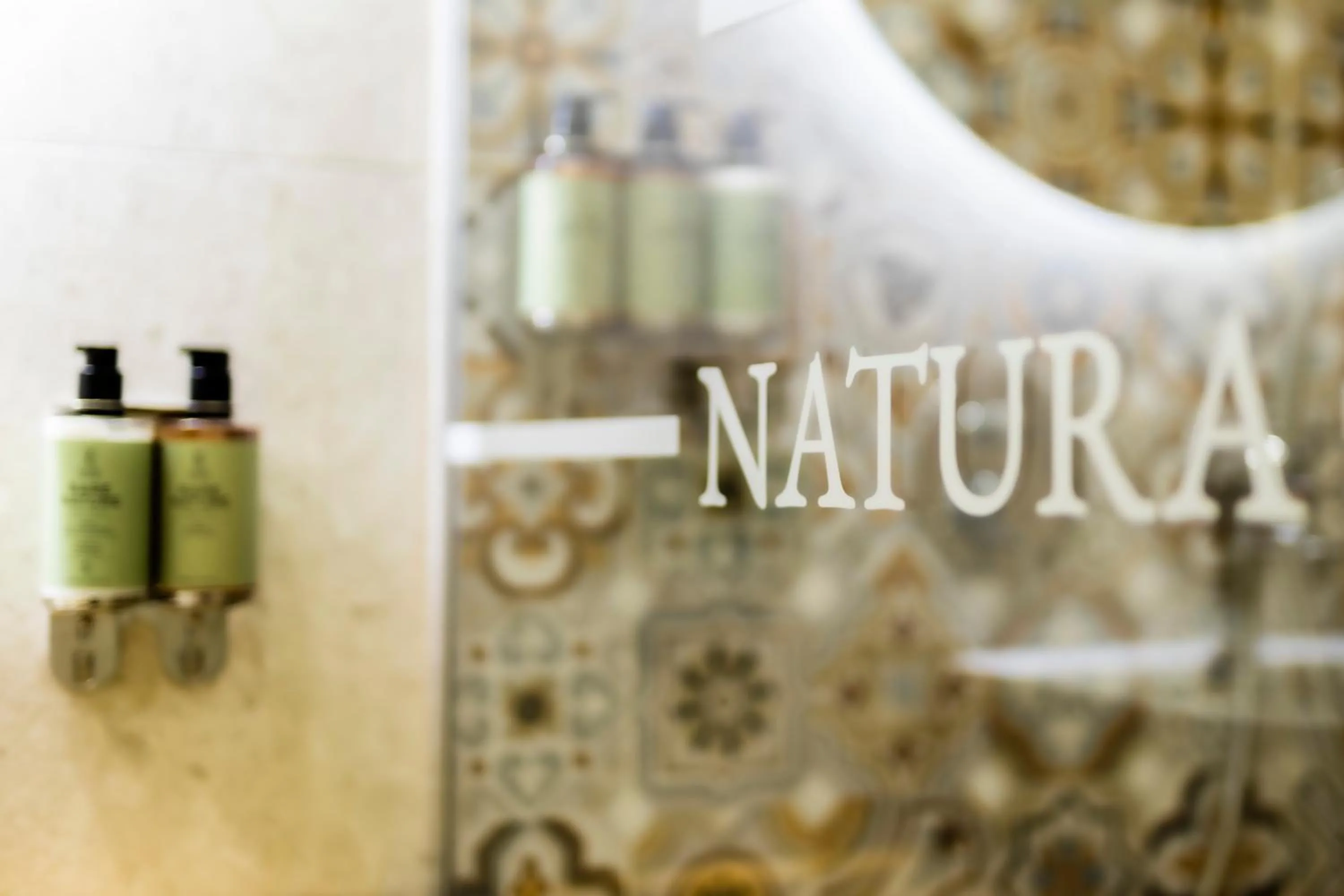 Property logo or sign in Natura All Seasons Boutique Hotel