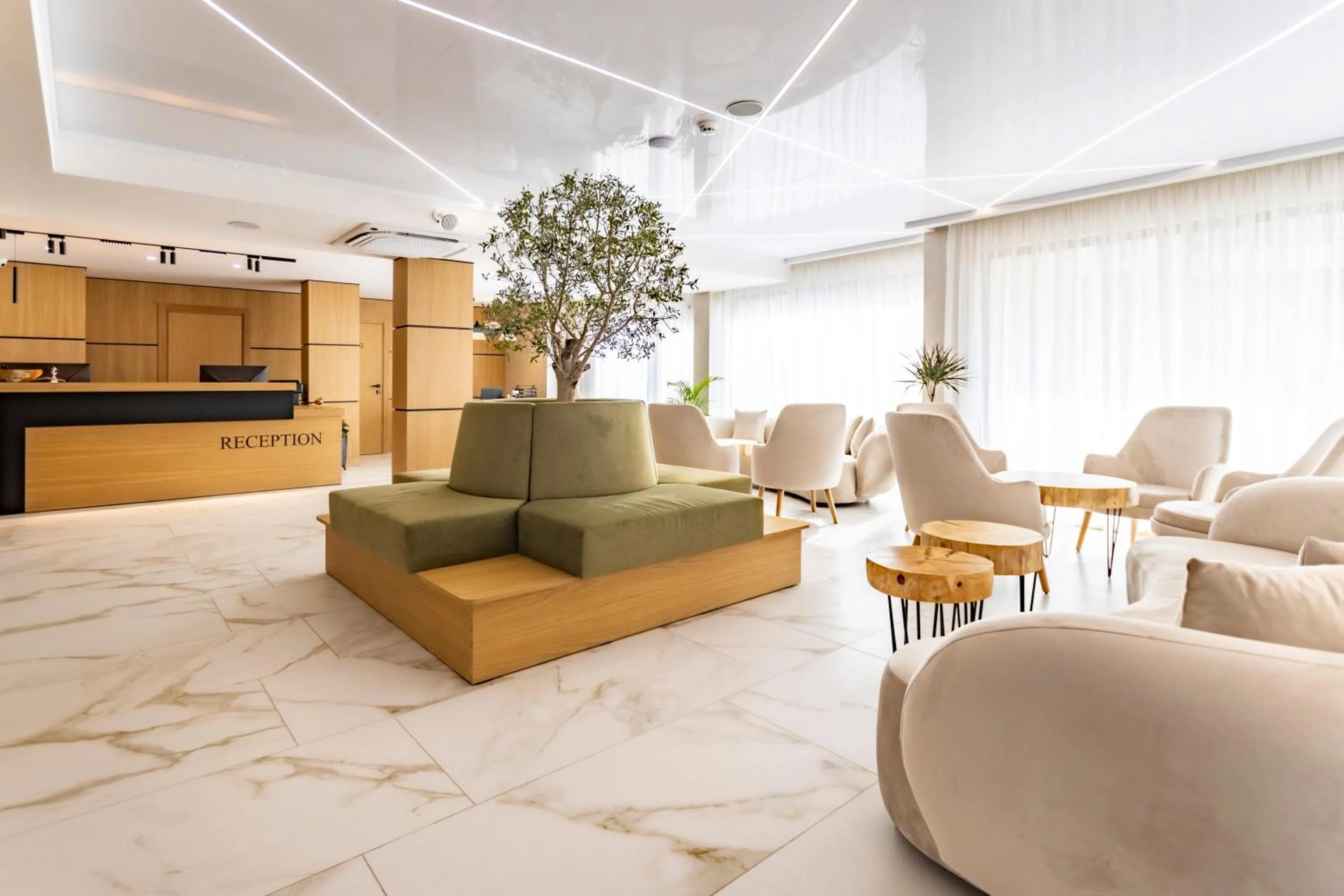 Lobby or reception in Natura All Seasons Boutique Hotel