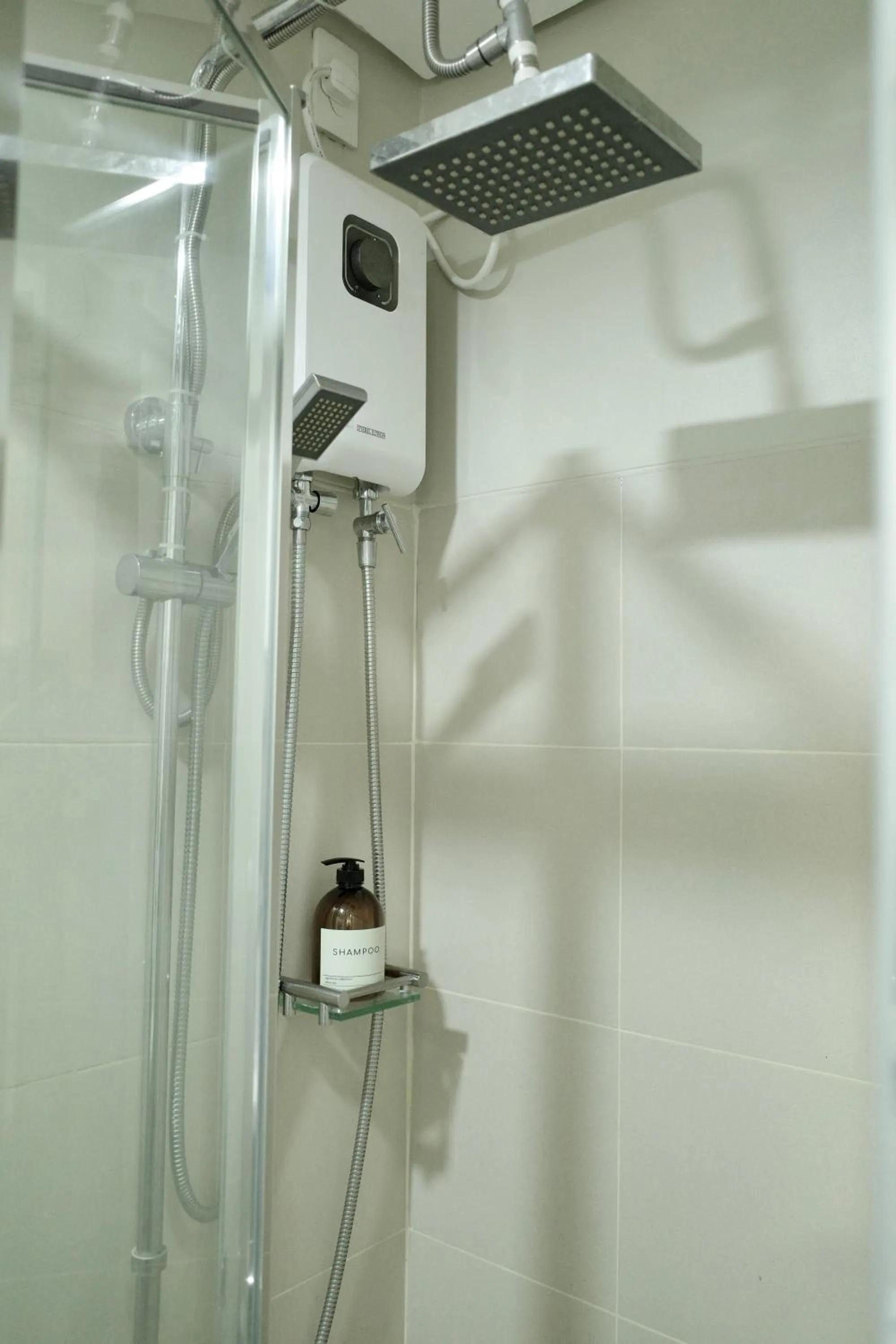 Shower in KDstays - Fame Residences