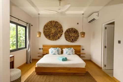 Bed in Anse Boudin Chalets
