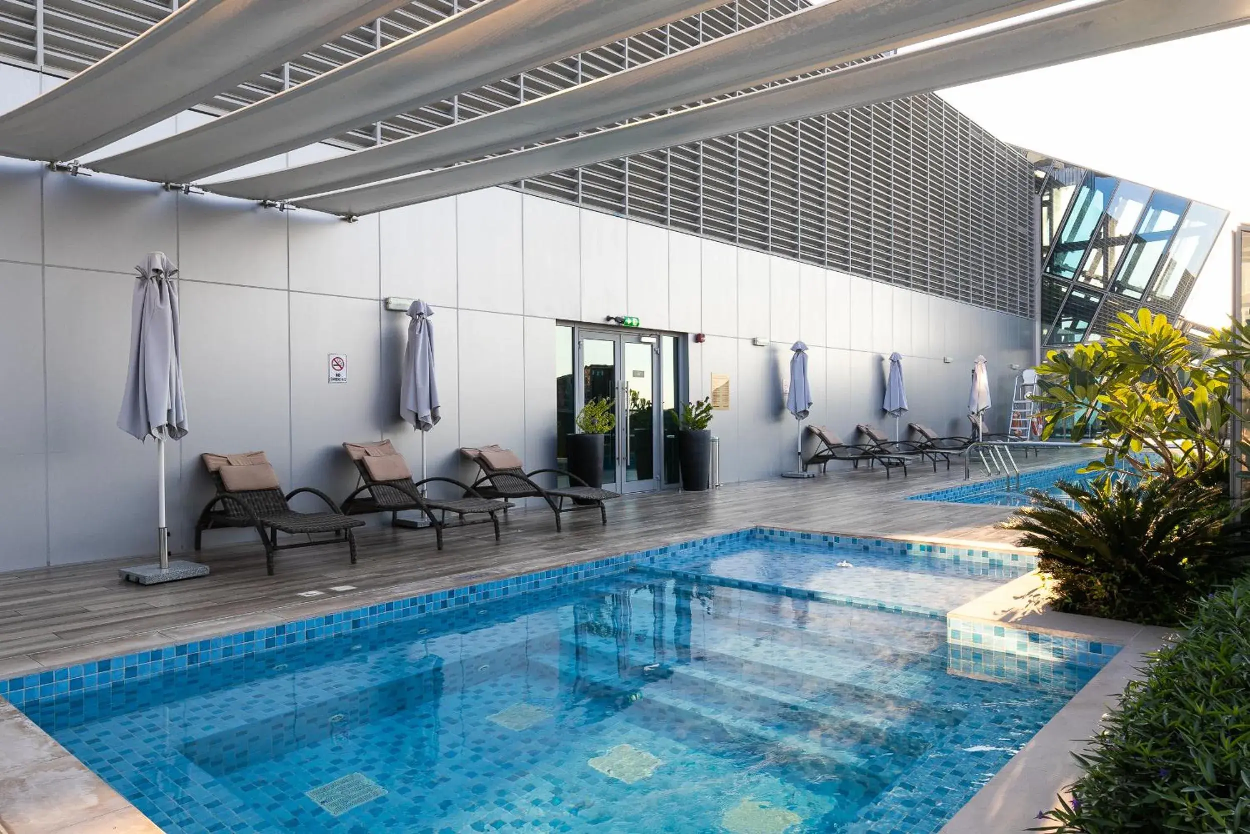 Swimming pool in GLOBALSTAY J One Tower Apartments at Pearl of UAE Swimming pool in GLOBALSTAY J One Tower Apartments at Pearl of UAE