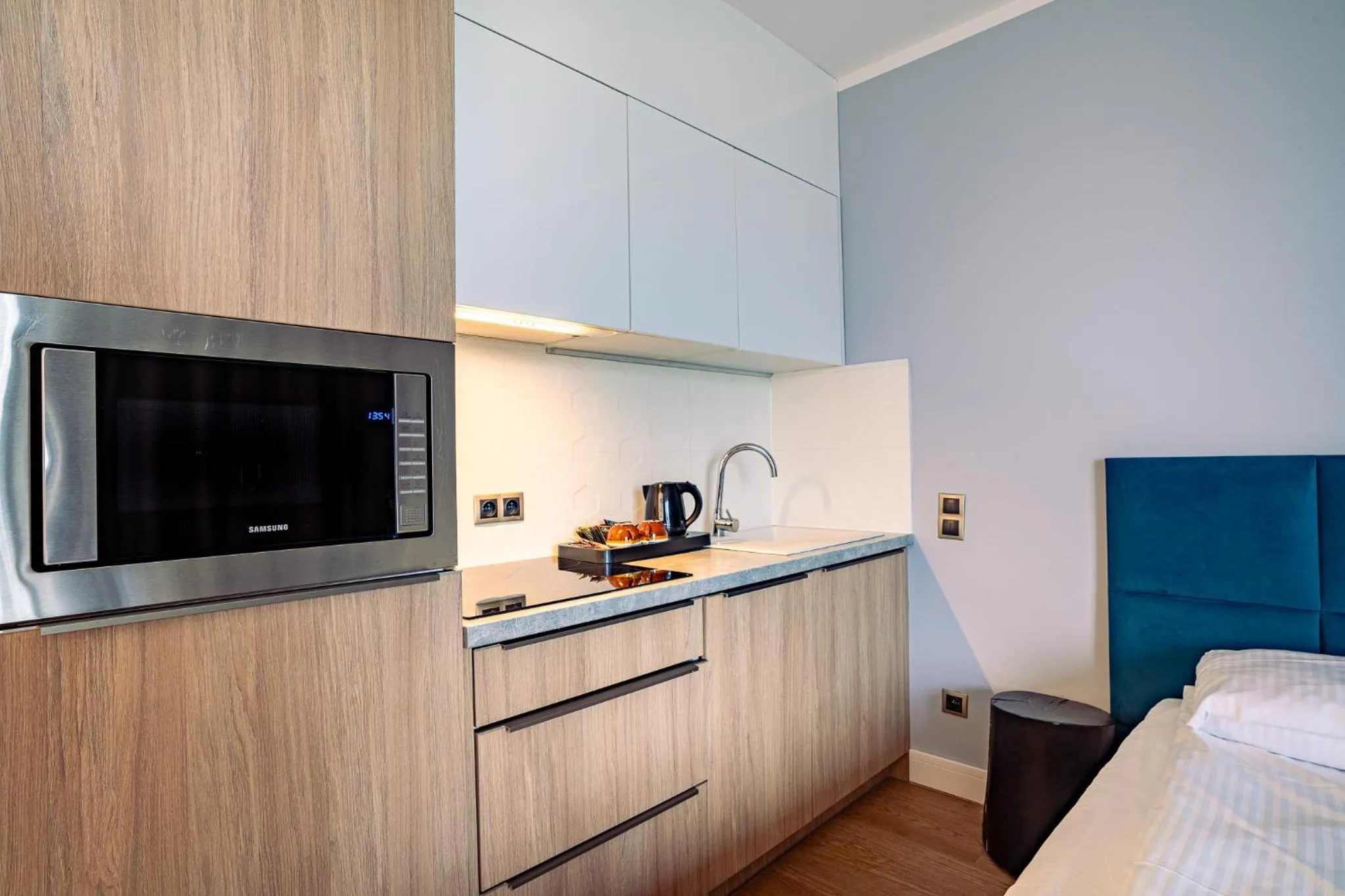 Kitchen or kitchenette, Bed in Mielenko & Spa ex Baltin Hotel