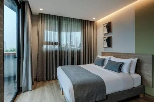 Bed in Heiss Hotel By Jalo