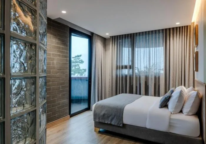 Bed in Heiss Hotel By Jalo