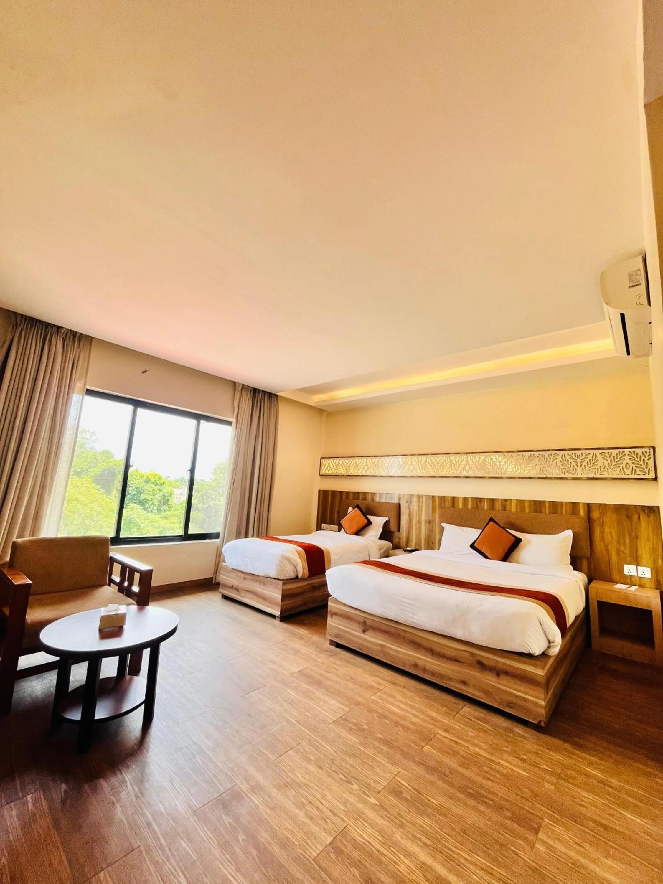 Bed in Park Safari Resort, Chitwan National Park