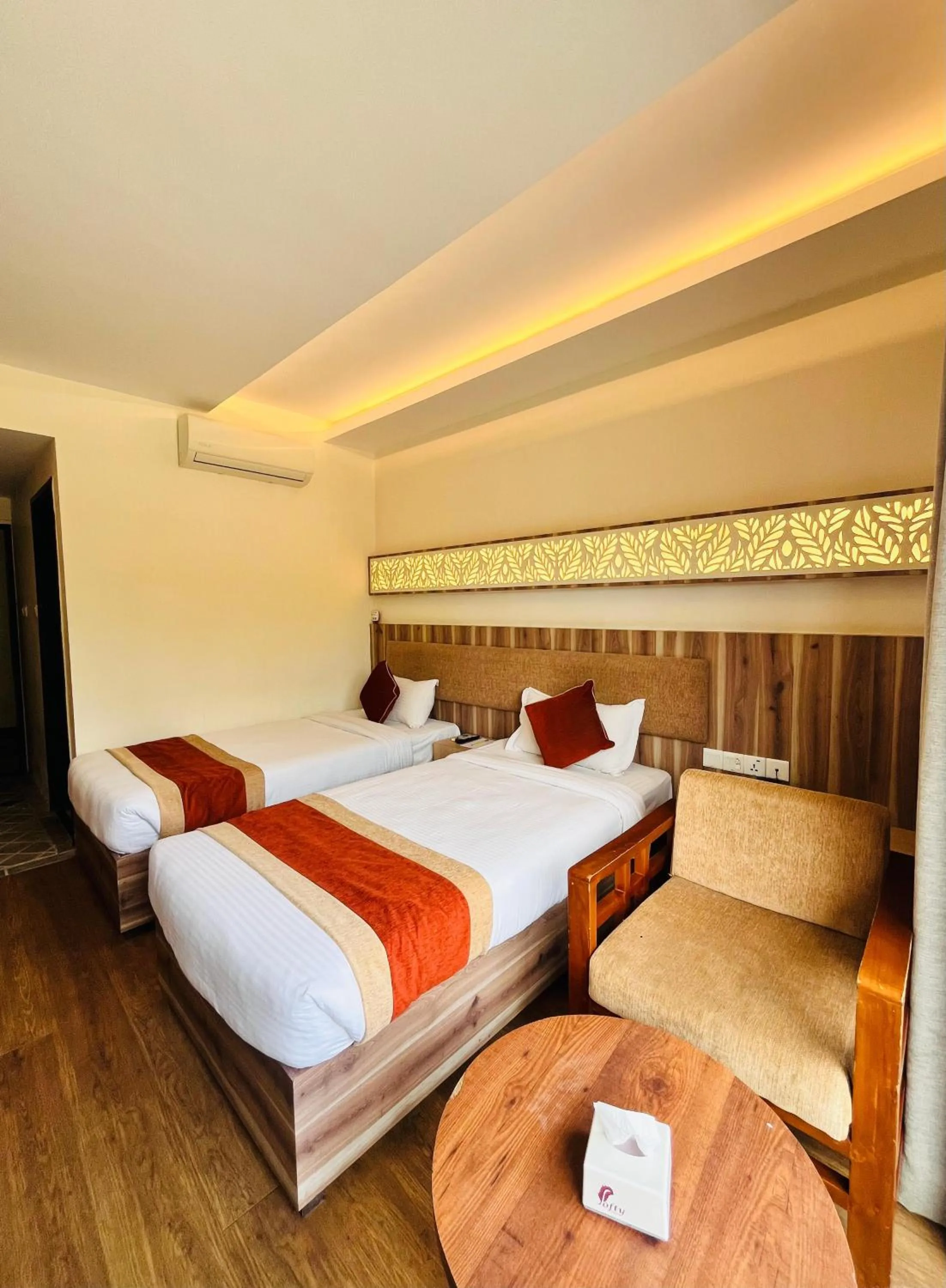 Bed in Park Safari Resort, Chitwan National Park