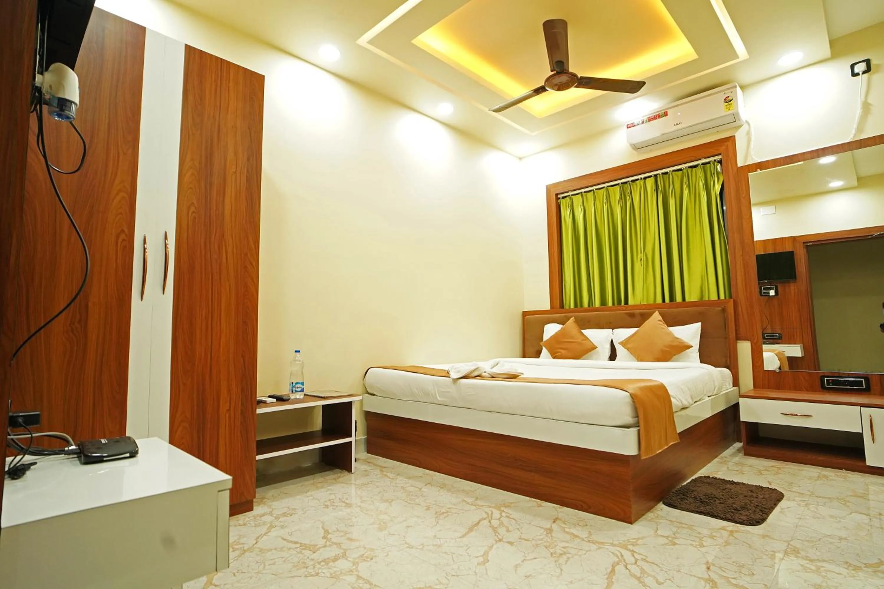 Communal lounge/ TV room, Bed in PS Luxury Hotel