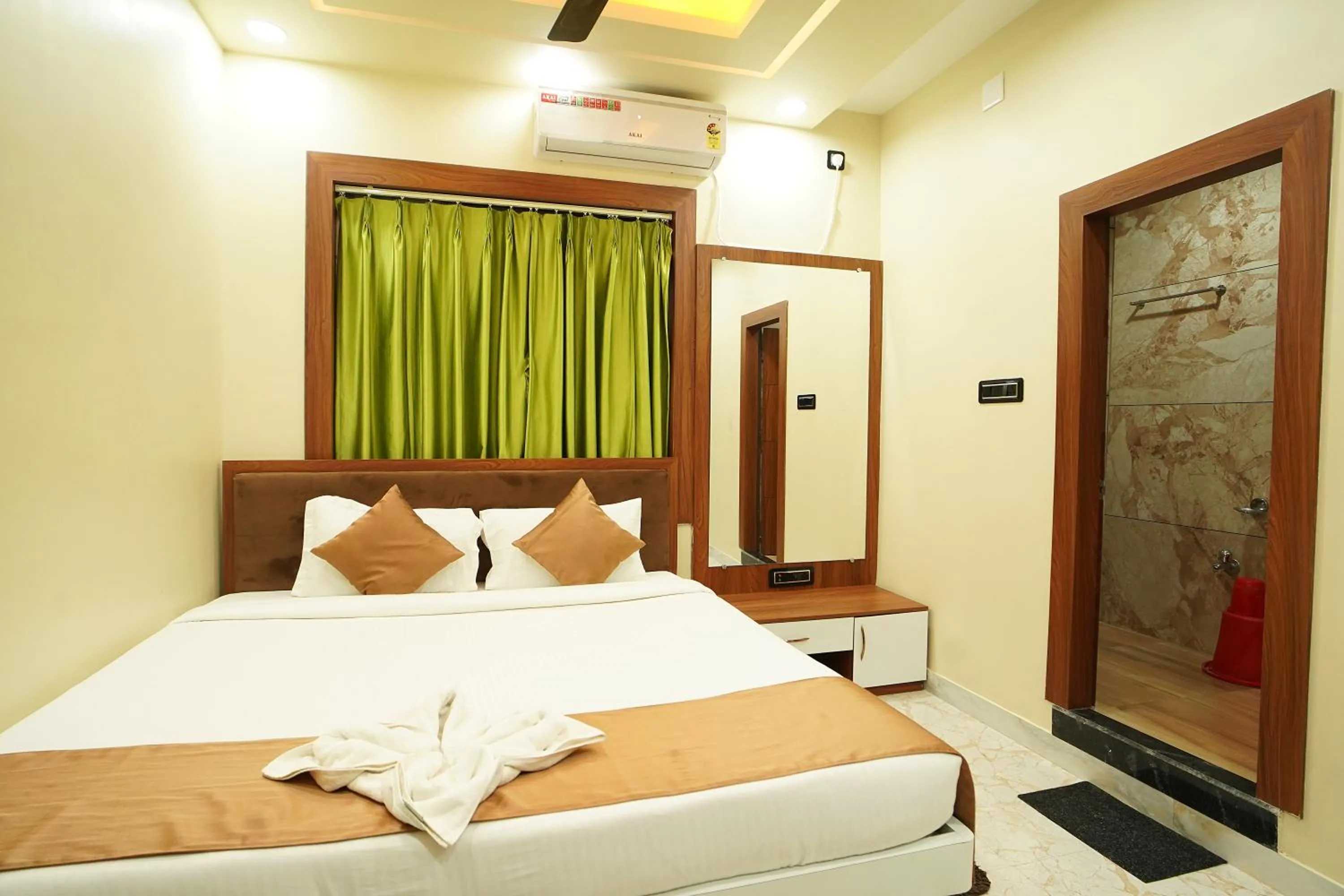 Bed in PS Luxury Hotel