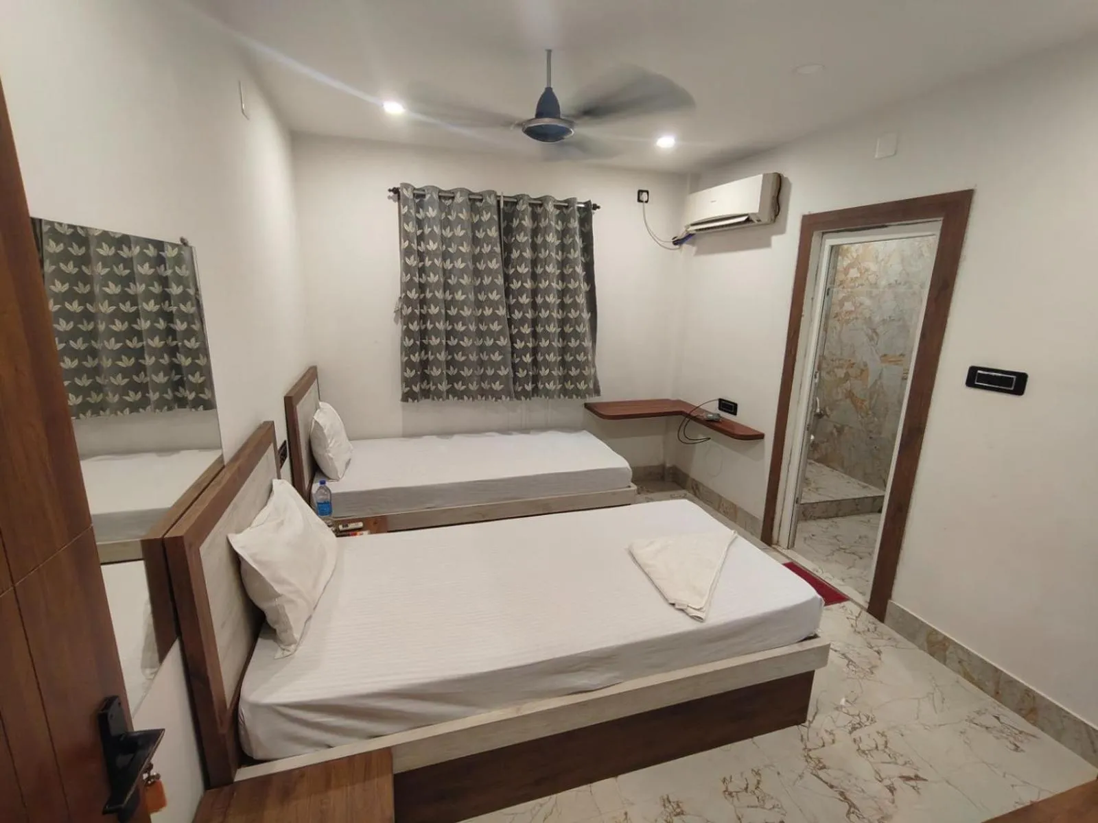 Bed in PS Luxury Hotel
