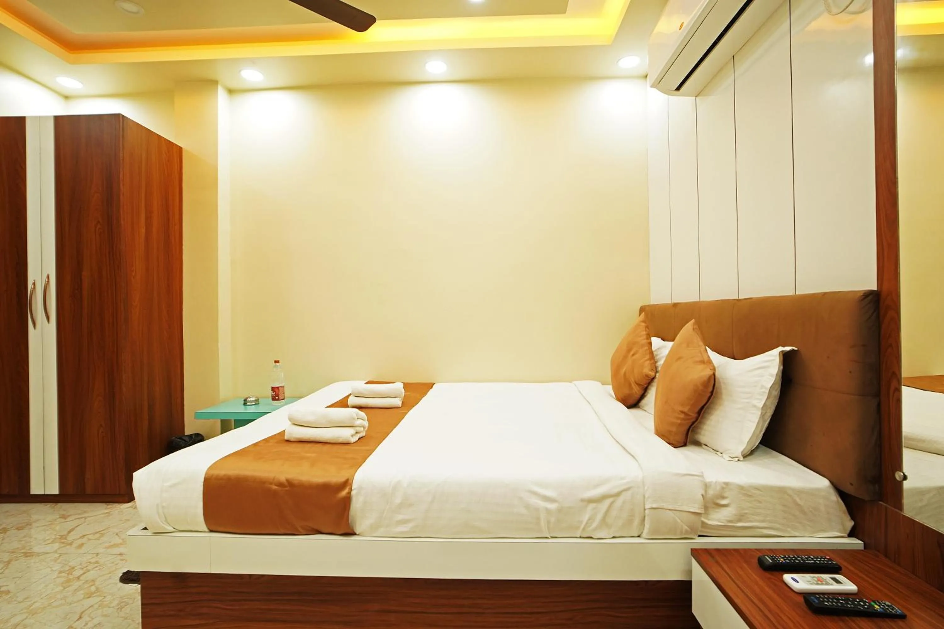 Bed in PS Luxury Hotel
