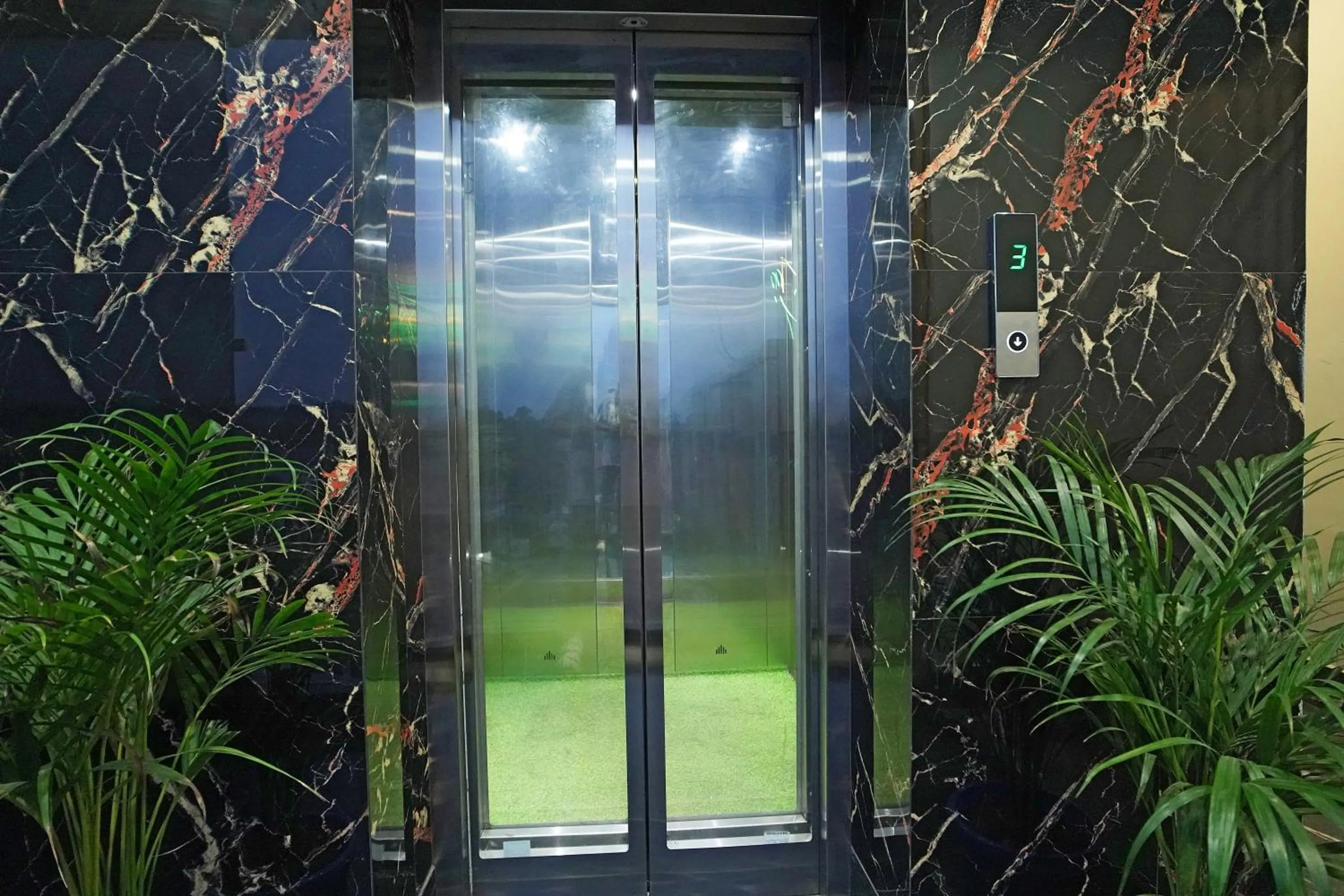 elevator in PS Luxury Hotel