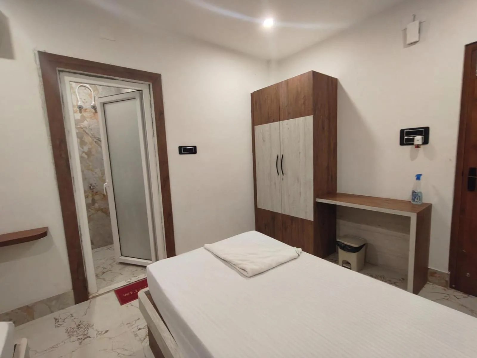Bed in PS Luxury Hotel