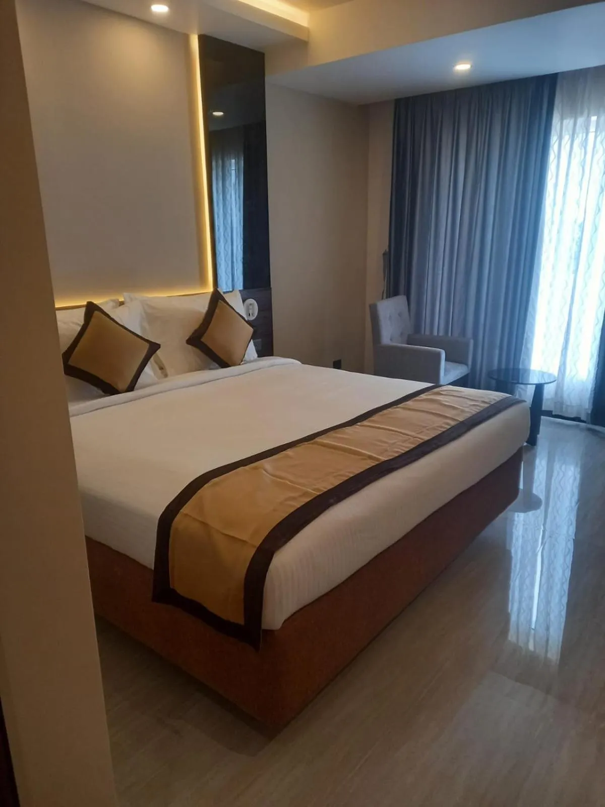 Bed in PS Luxury Hotel