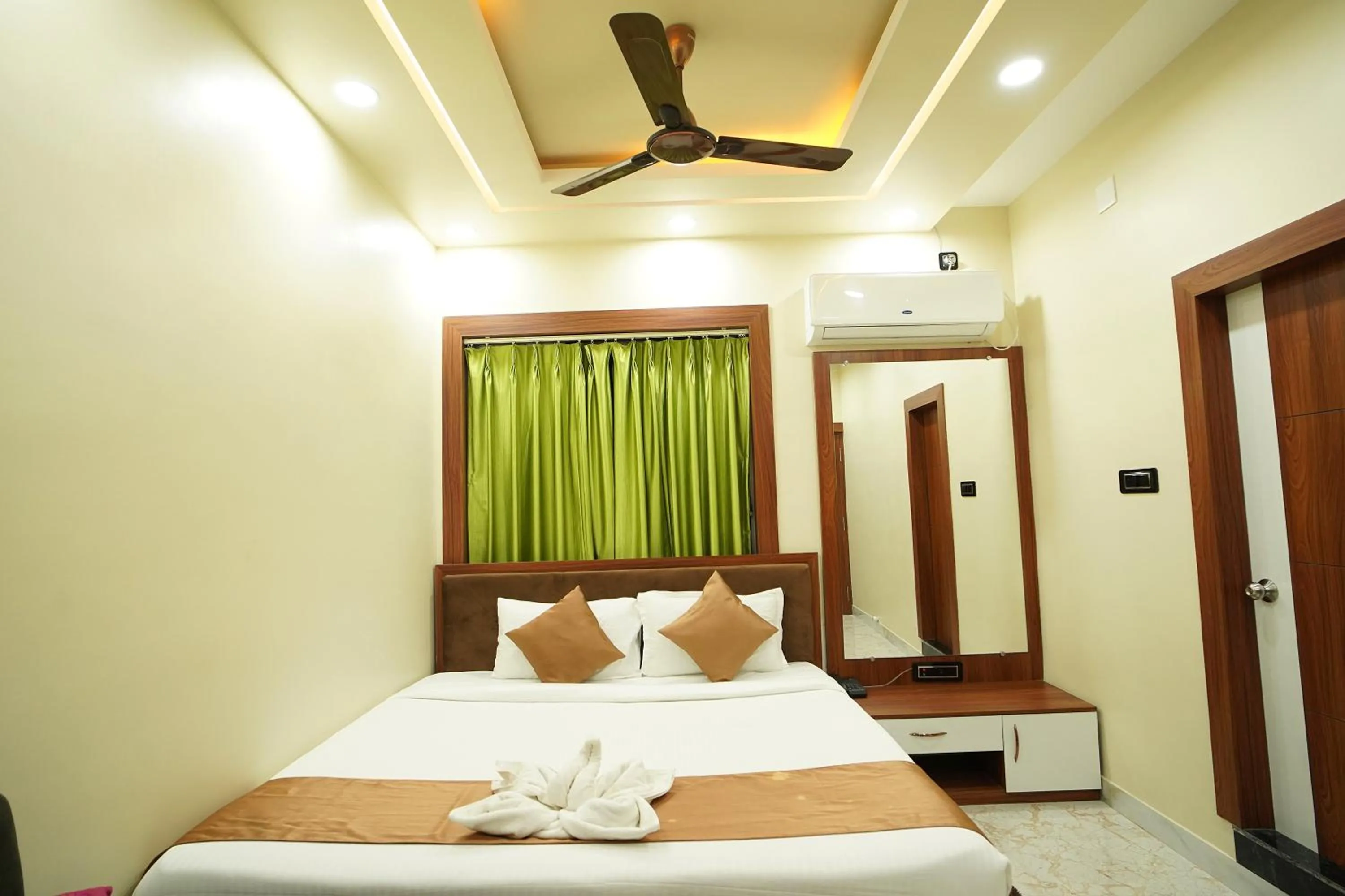 Bed in PS Luxury Hotel