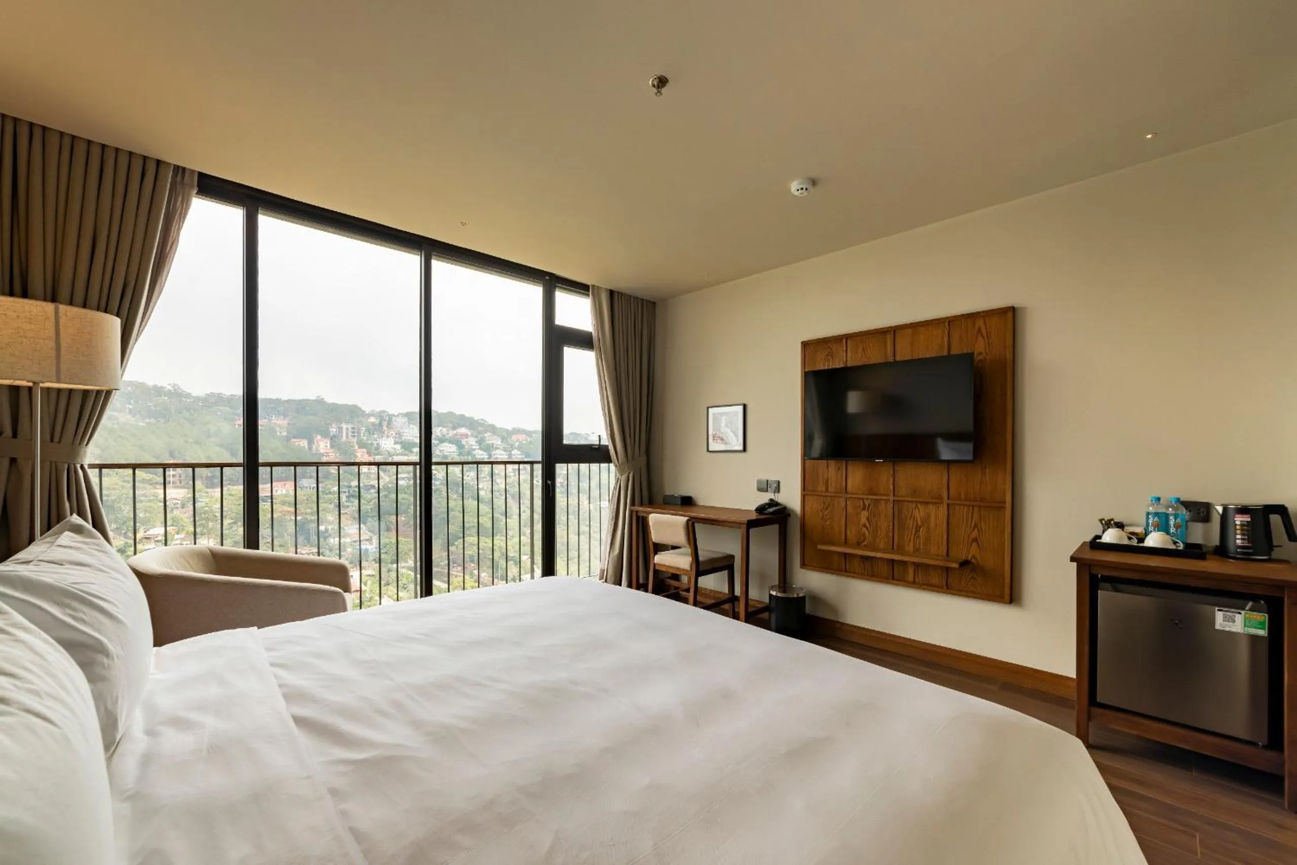 Communal lounge/ TV room, Bed in HLS Dalat Lodge