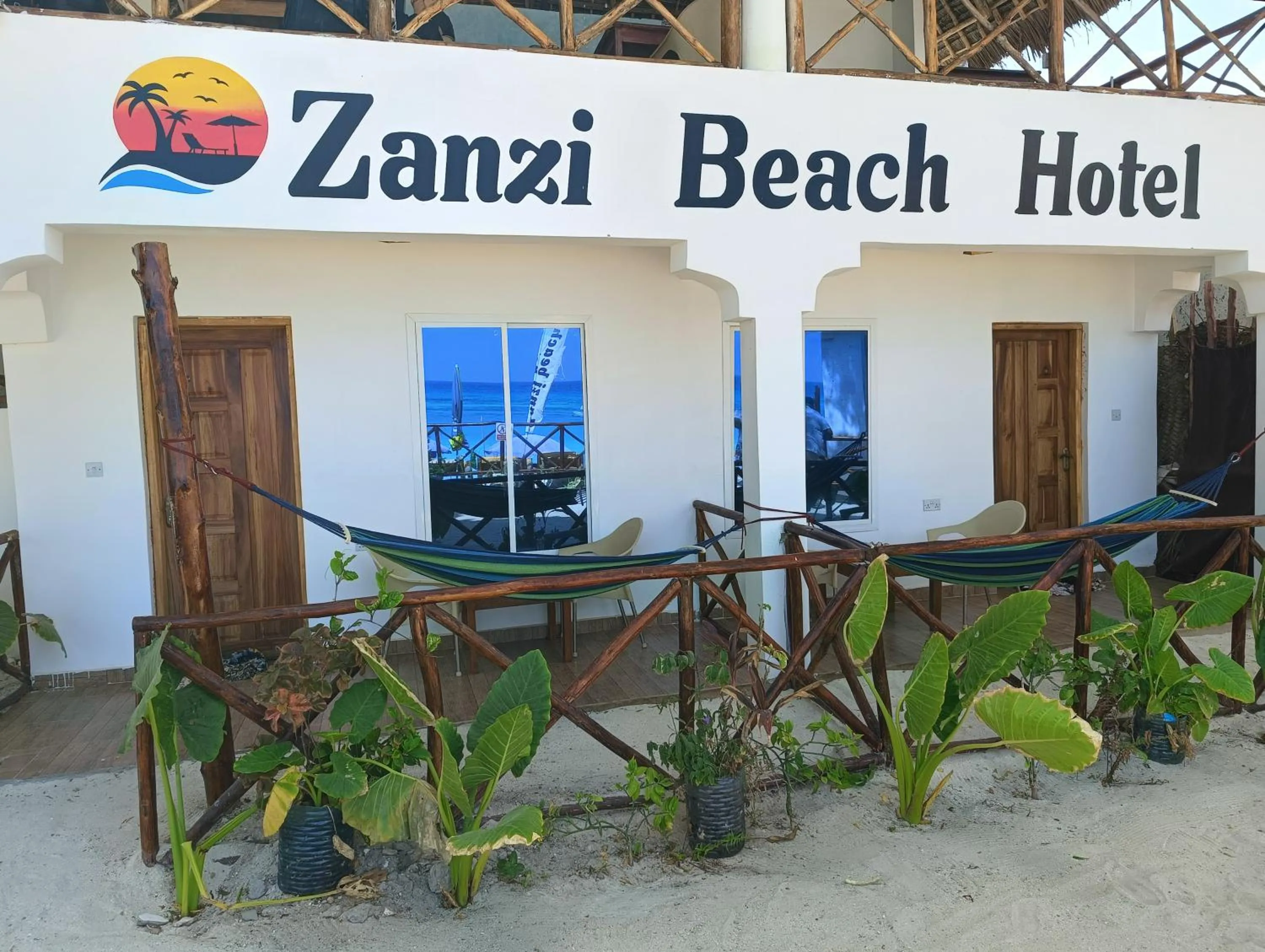 Property logo or sign in Zanzi beach hotel