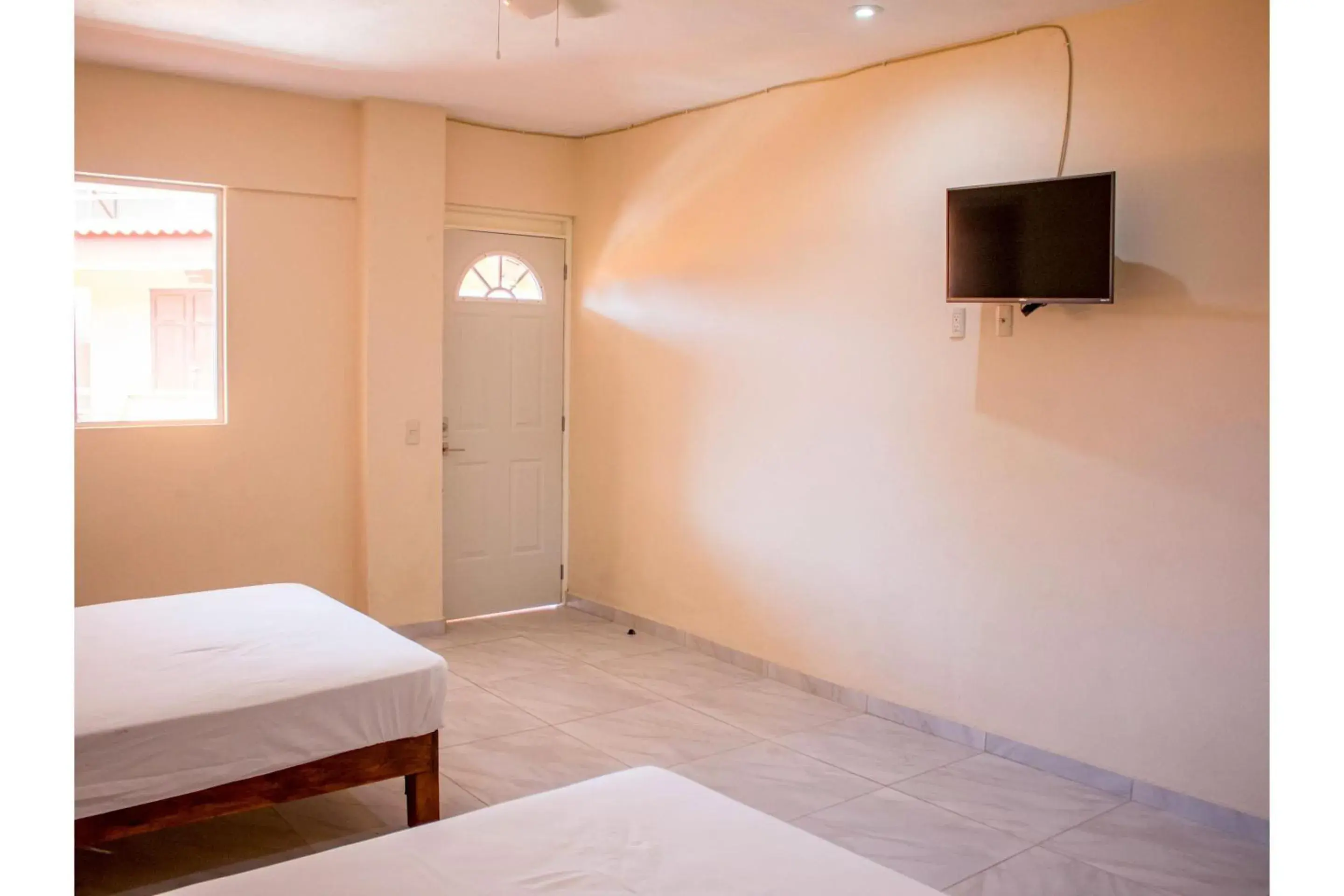 Bedroom, Bed in OYO Hotel La Playa Bedroom, Bed in OYO Hotel La Playa