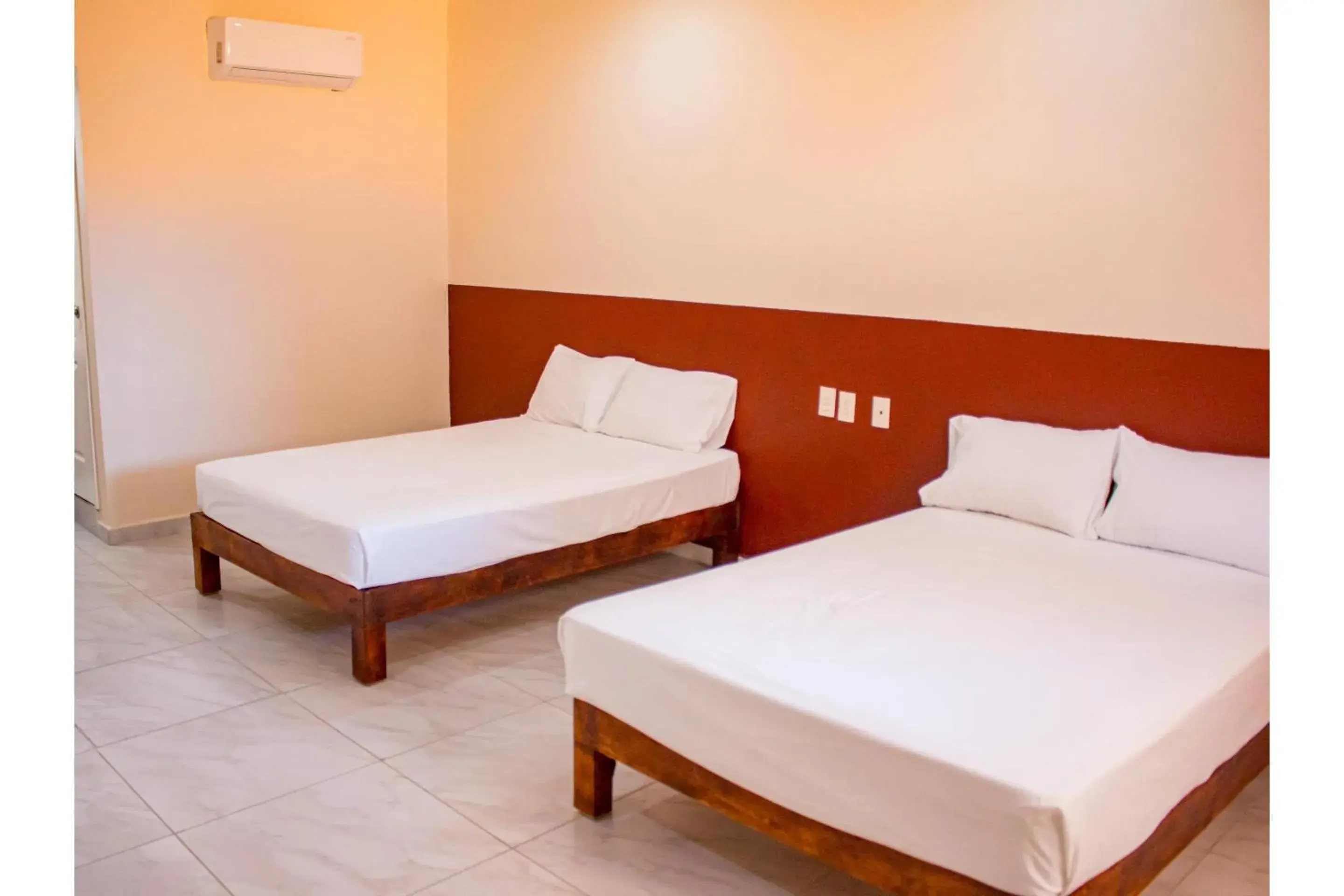 Bedroom, Bed in OYO Hotel La Playa Bedroom, Bed in OYO Hotel La Playa