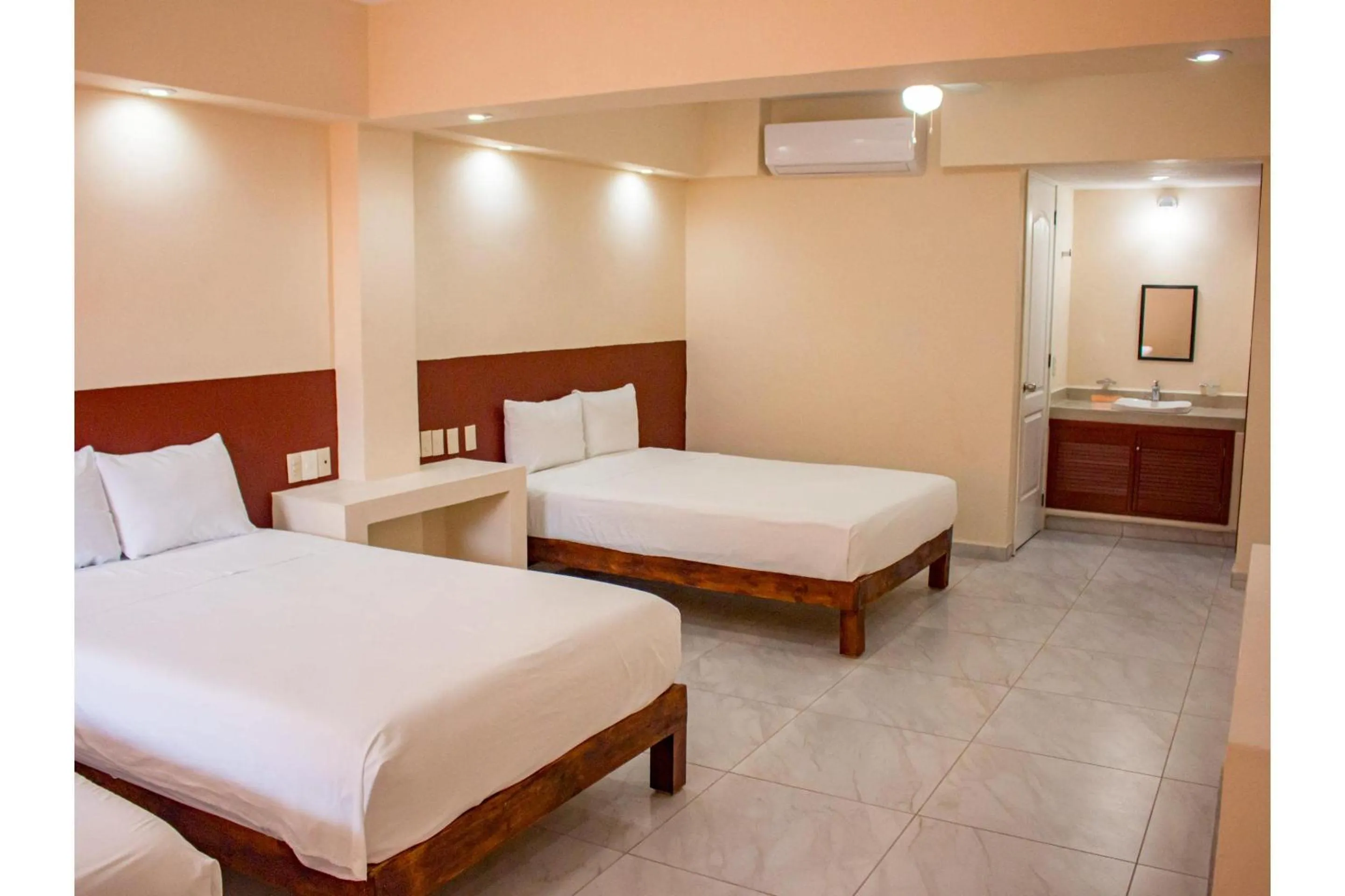 Bedroom, Bed in OYO Hotel La Playa