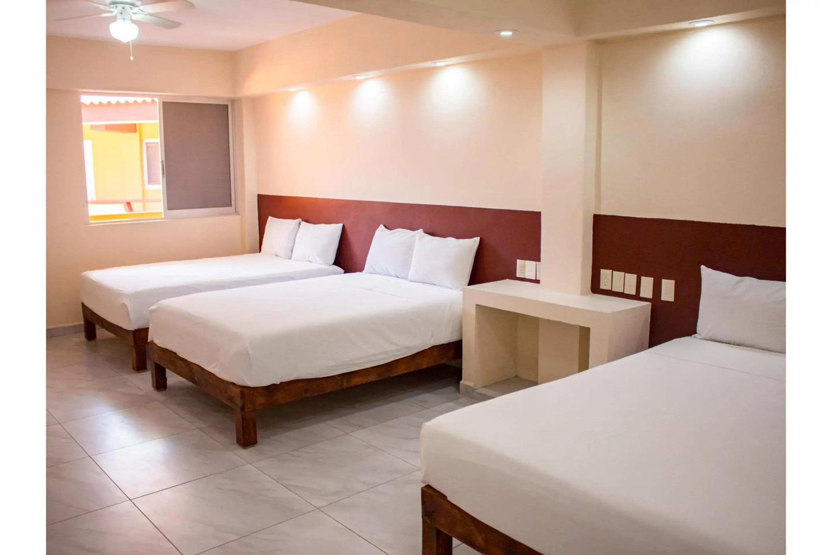 Bedroom, Bed in OYO Hotel La Playa Bedroom, Bed in OYO Hotel La Playa