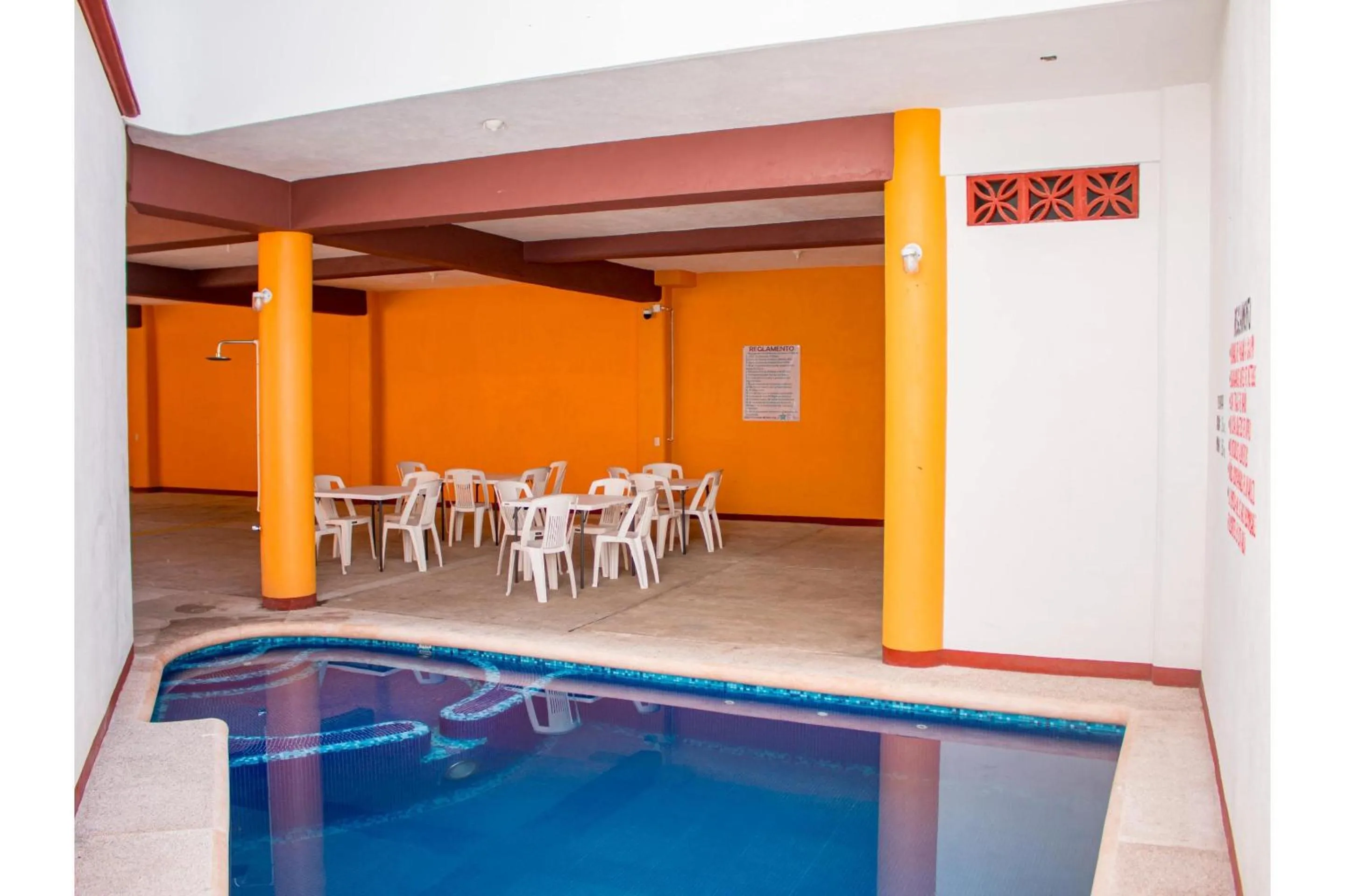 Swimming pool in OYO Hotel La Playa